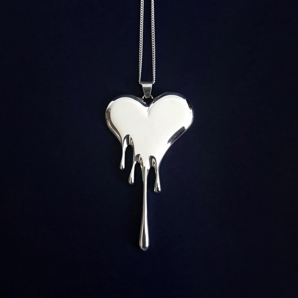 Made to order Bloody Necklace, includes pendant and chain.

Made in .950 sterling silver
Dimensions W30 mm x H60 mm
Chain length 24”
24 grams of silver
Includes identification tag

The Bloody pieces with their drops silhouette inspired this pendant
