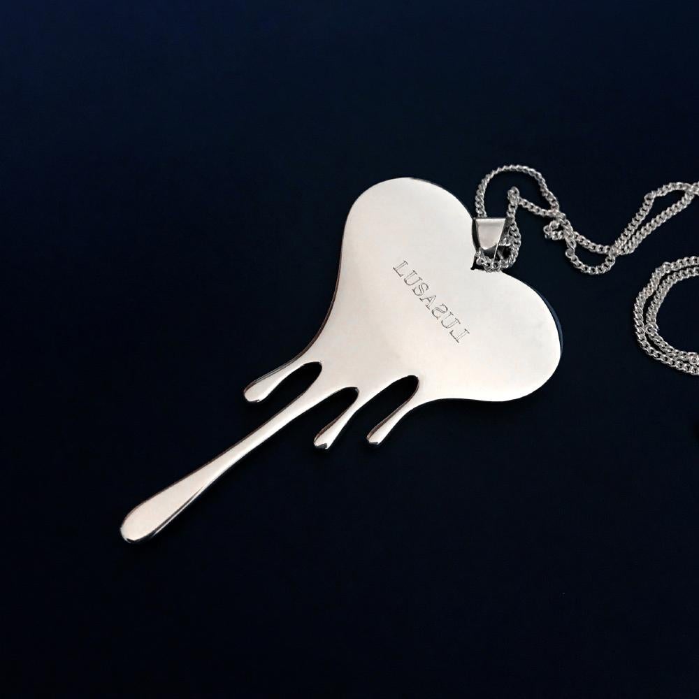 Contemporary Bloody Heart Necklace made in Sterling Silver For Sale