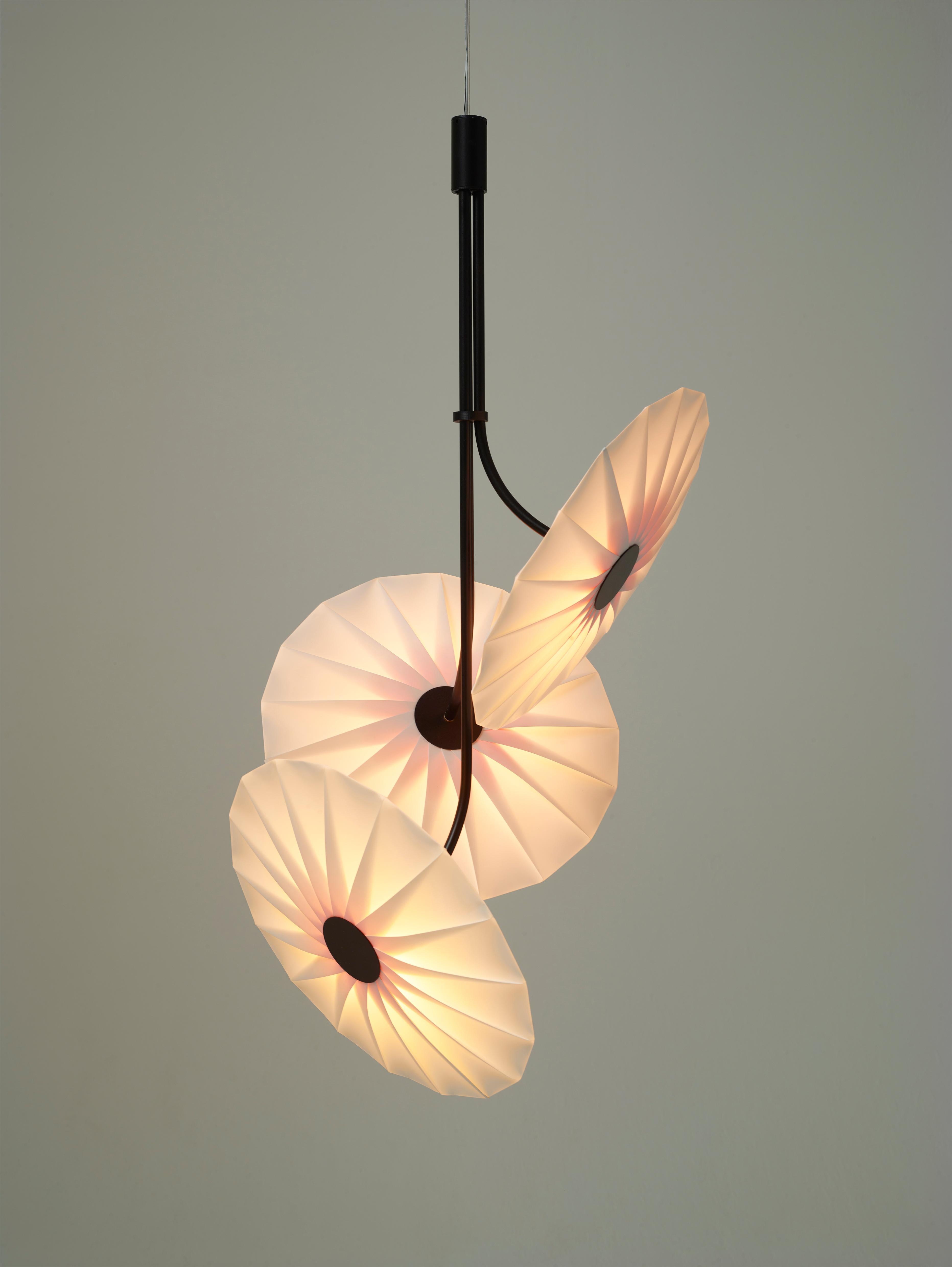 The Bloom lighting collection is designed by Studio Umut Yamac and handmade in their London studio. 

Taking inspiration from spring blossoms, the Bloom lights are a limited collection of hand crafted origami lights. Made from synthetic paper, both