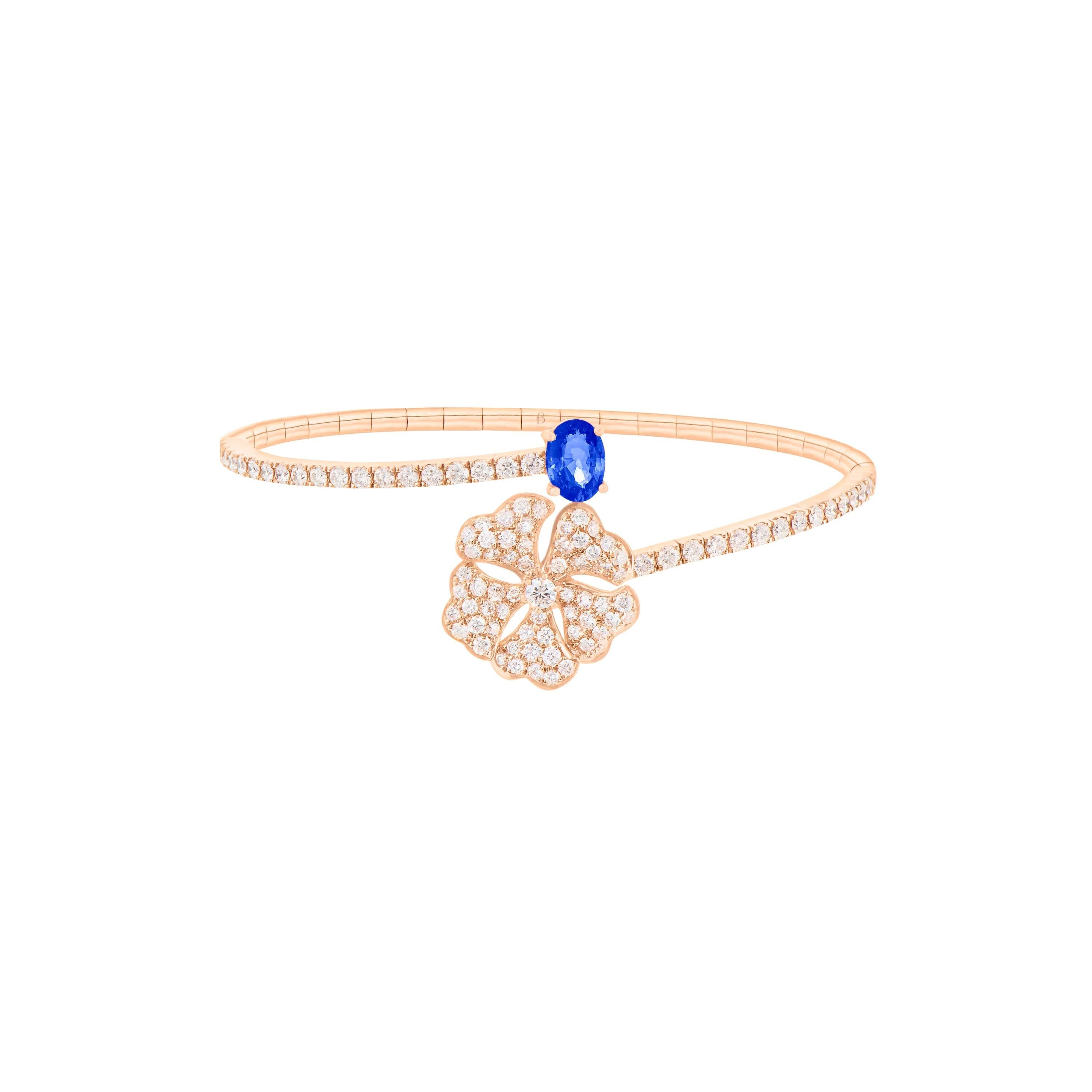 Bloom Blue Sapphire and Diamond Open Spiral Bangle in 18K Rose Gold

Inspired by the exquisite petals of the alpine cinquefoil flower, the Bloom collection combines the richness of diamonds and precious metals with the light versatility of this