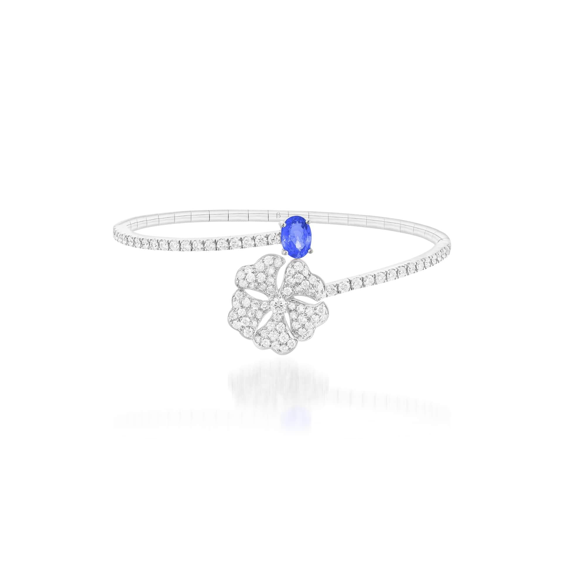 Bloom Blue Sapphire and Diamond Open Spiral Bangle in 18K White Gold

Inspired by the exquisite petals of the alpine cinquefoil flower, the Bloom collection combines the richness of diamonds and precious metals with the light versatility of this