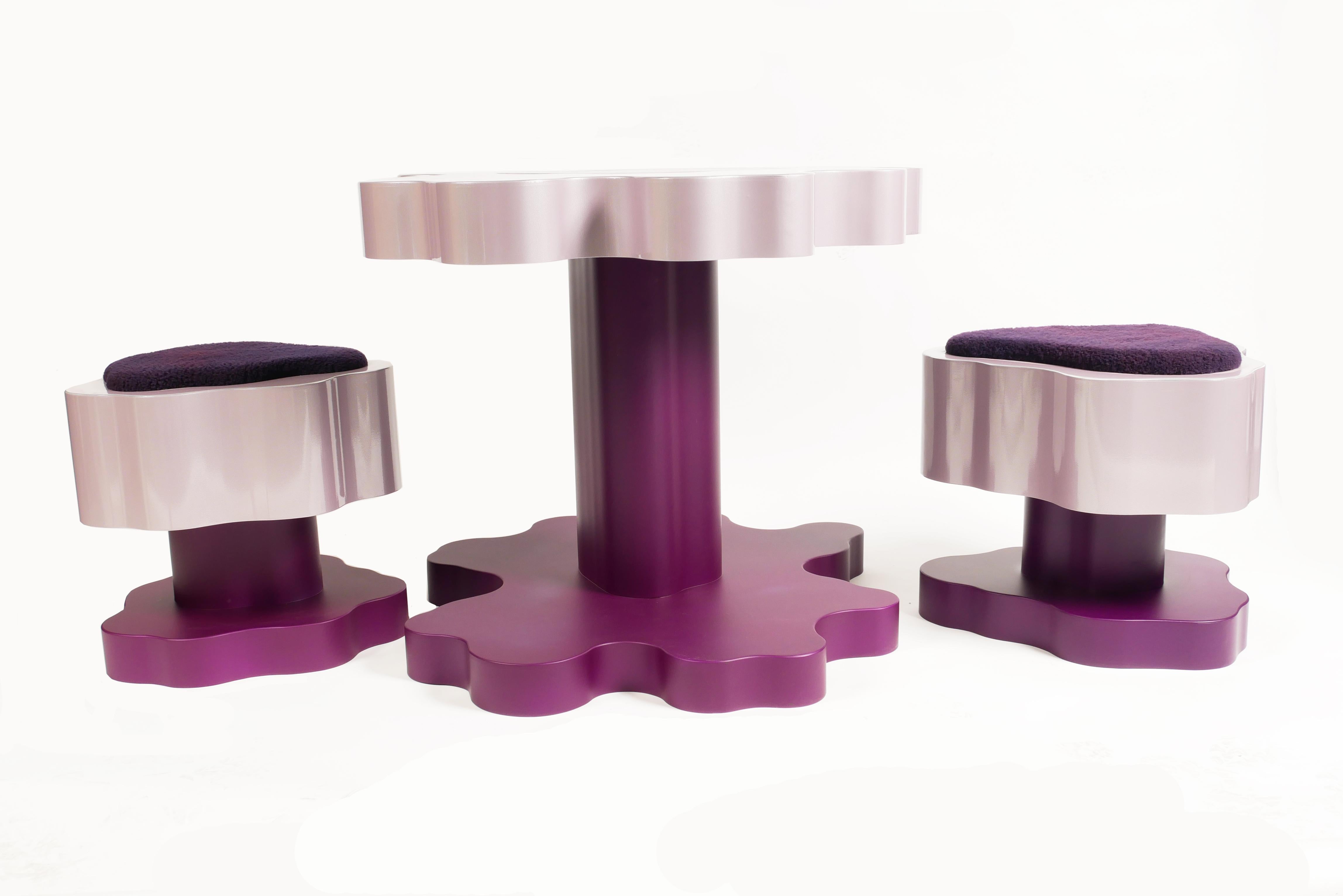 Bloom Cafe Set by Bert Furnari

Powder-Coated Aluminum, Oak Ply Table Insert, Dyed Shearling Cushions

Table- 36