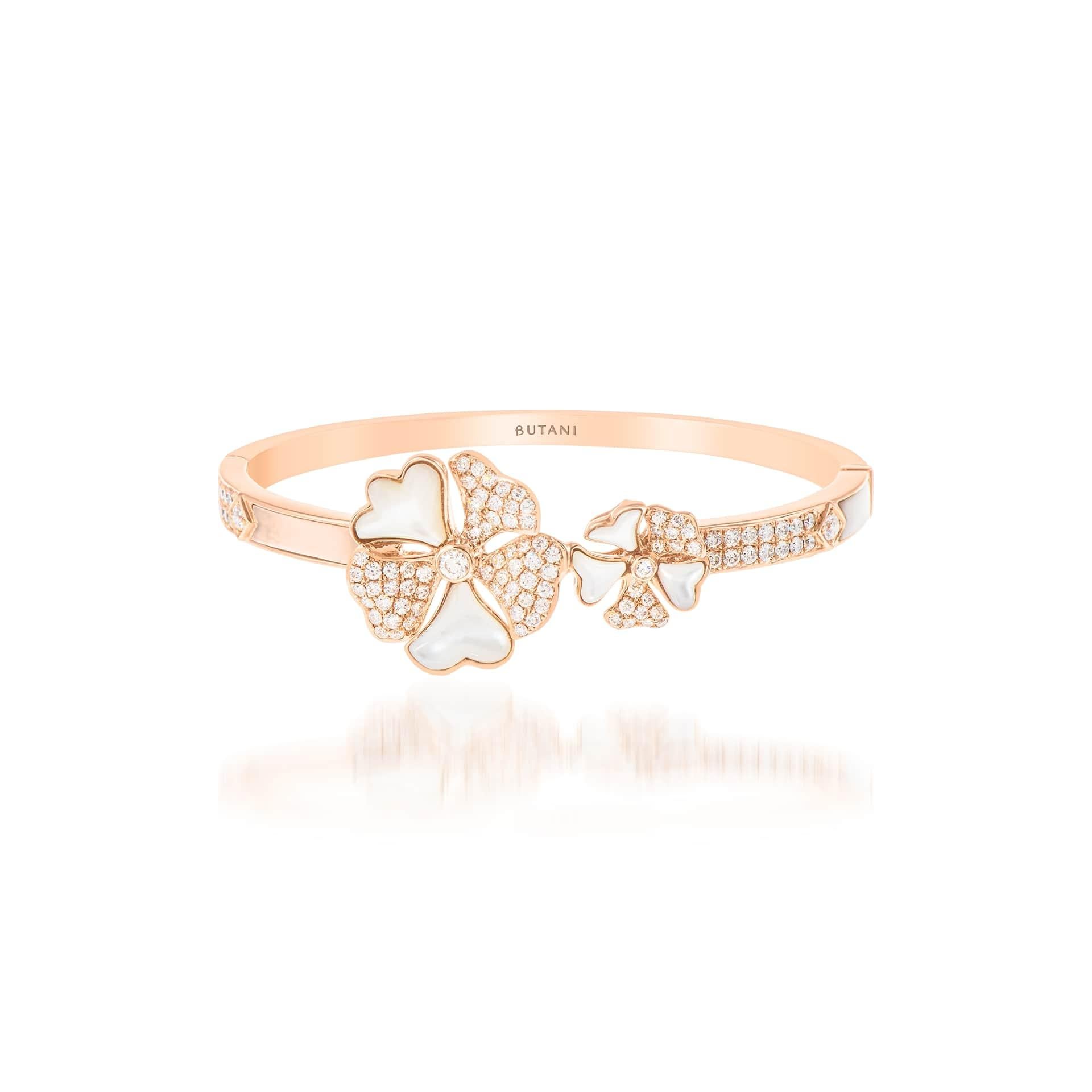 Bloom Diamond and Mother-of-Pearl Duo Flower Bangle in 18K Rose Gold

Inspired by the exquisite petals of the alpine cinquefoil flower, the Bloom collection combines the richness of diamonds and precious metals with the light versatility of this