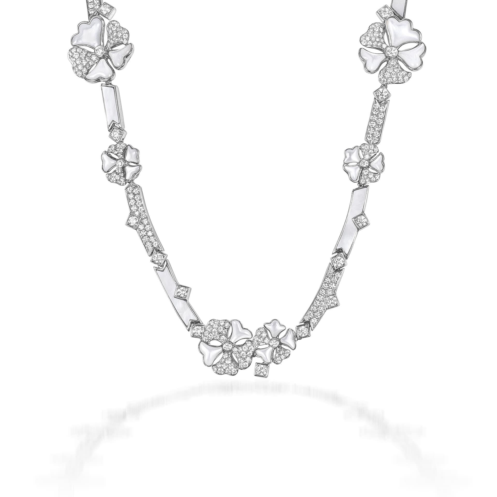 Bloom Diamond and Mother-of-Pearl Long Flower Chain Necklace in 18K White Gold

Inspired by the exquisite petals of the alpine cinquefoil flower, the Bloom collection combines the richness of diamonds and precious metals with the light versatility