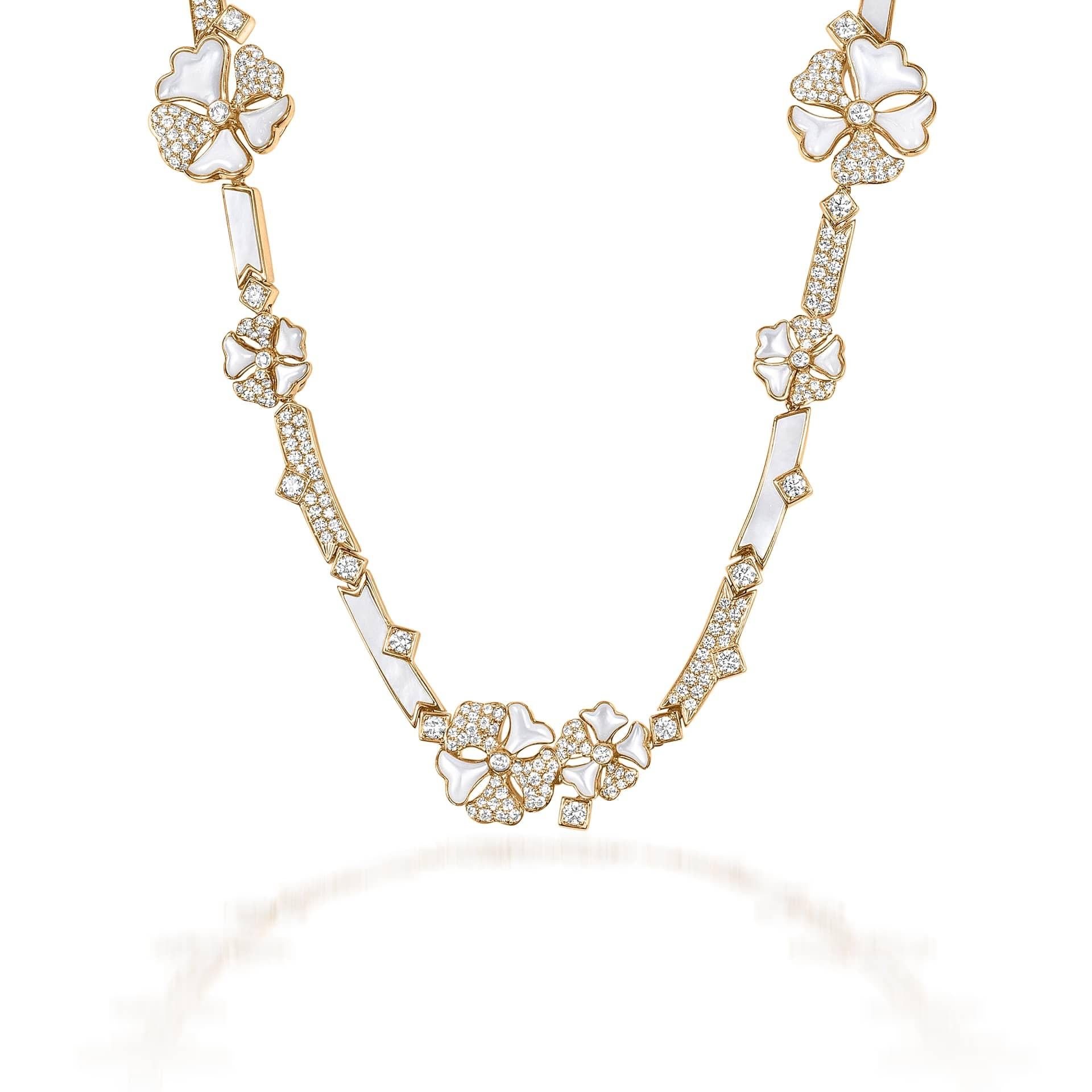 Bloom Diamond and Mother-of-Pearl Long Flower Chain Necklace in 18K Yellow Gold

Inspired by the exquisite petals of the alpine cinquefoil flower, the Bloom collection combines the richness of diamonds and precious metals with the light versatility