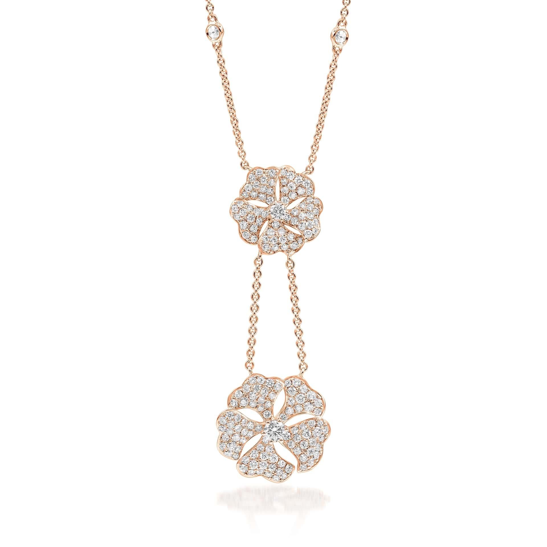Bloom Diamond Drop Flower Necklace in 18K Rose Gold

Inspired by the exquisite petals of the alpine cinquefoil flower, the Bloom collection combines the richness of diamonds and precious metals with the light versatility of this delicate,