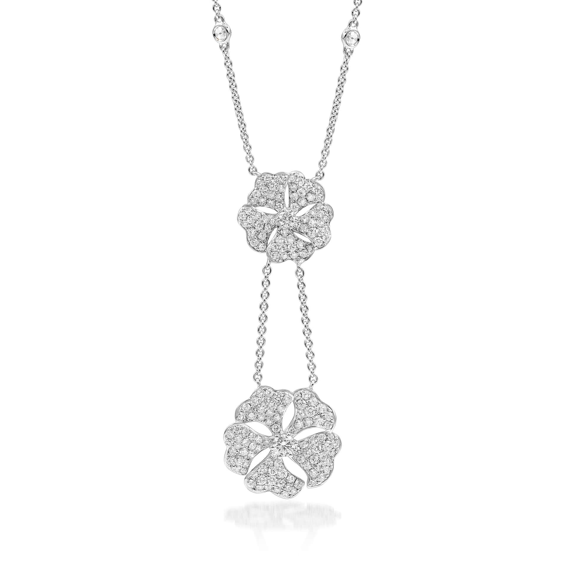 Bloom Diamond Drop Flower Necklace in 18K White Gold

Inspired by the exquisite petals of the alpine cinquefoil flower, the Bloom collection combines the richness of diamonds and precious metals with the light versatility of this delicate,