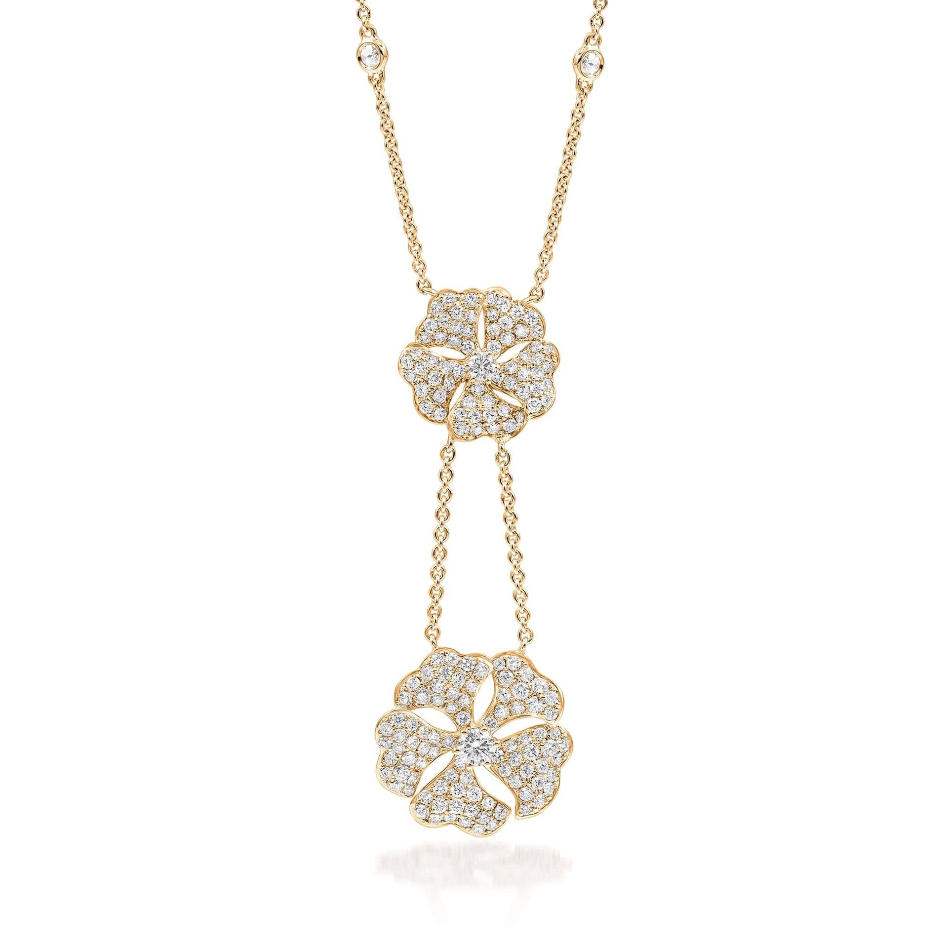 Bloom Diamond Drop Flower Necklace in 18K Yellow Gold

Inspired by the exquisite petals of the alpine cinquefoil flower, the Bloom collection combines the richness of diamonds and precious metals with the light versatility of this delicate,