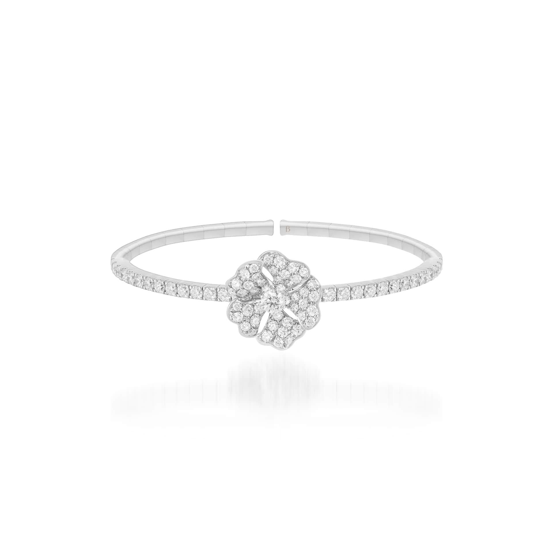 Bloom Diamond Solo Flower Bangle in 18K White Gold

Inspired by the exquisite petals of the alpine cinquefoil flower, the Bloom collection combines the richness of diamonds and precious metals with the light versatility of this delicate,