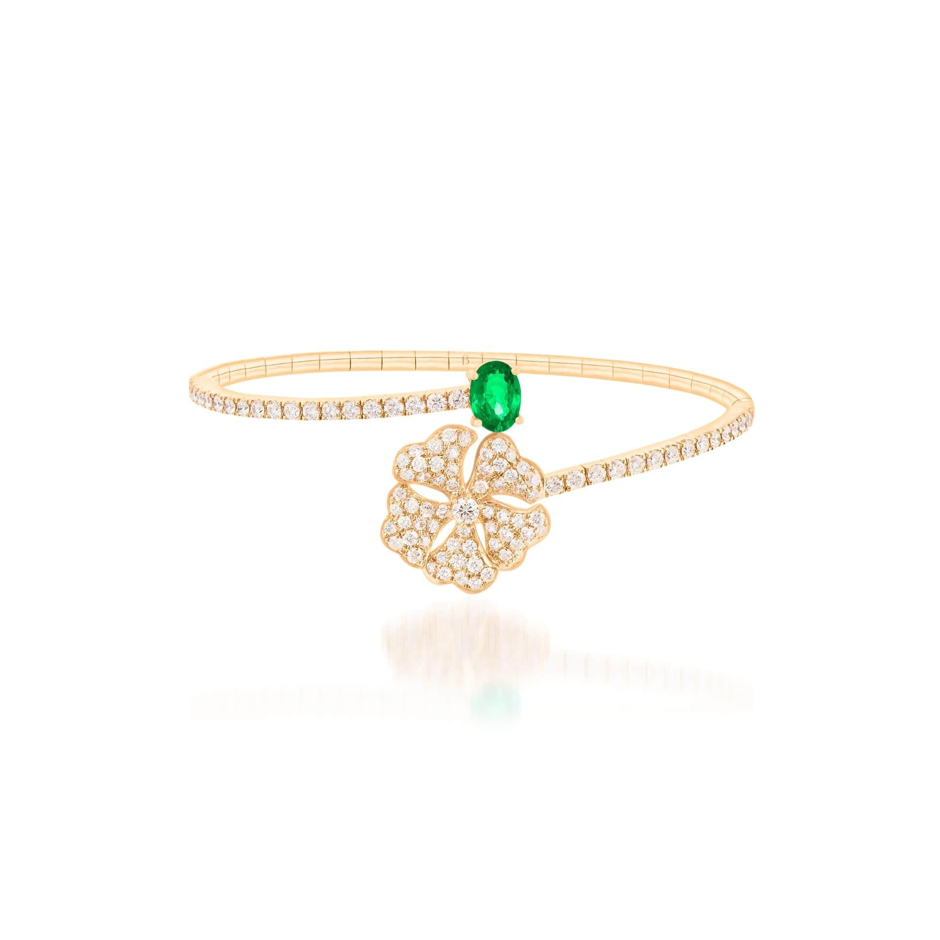 Bloom Emerald and Diamond Open Spiral Bangle in 18K Yellow Gold

Inspired by the exquisite petals of the alpine cinquefoil flower, the Bloom collection combines the richness of diamonds and precious metals with the light versatility of this
