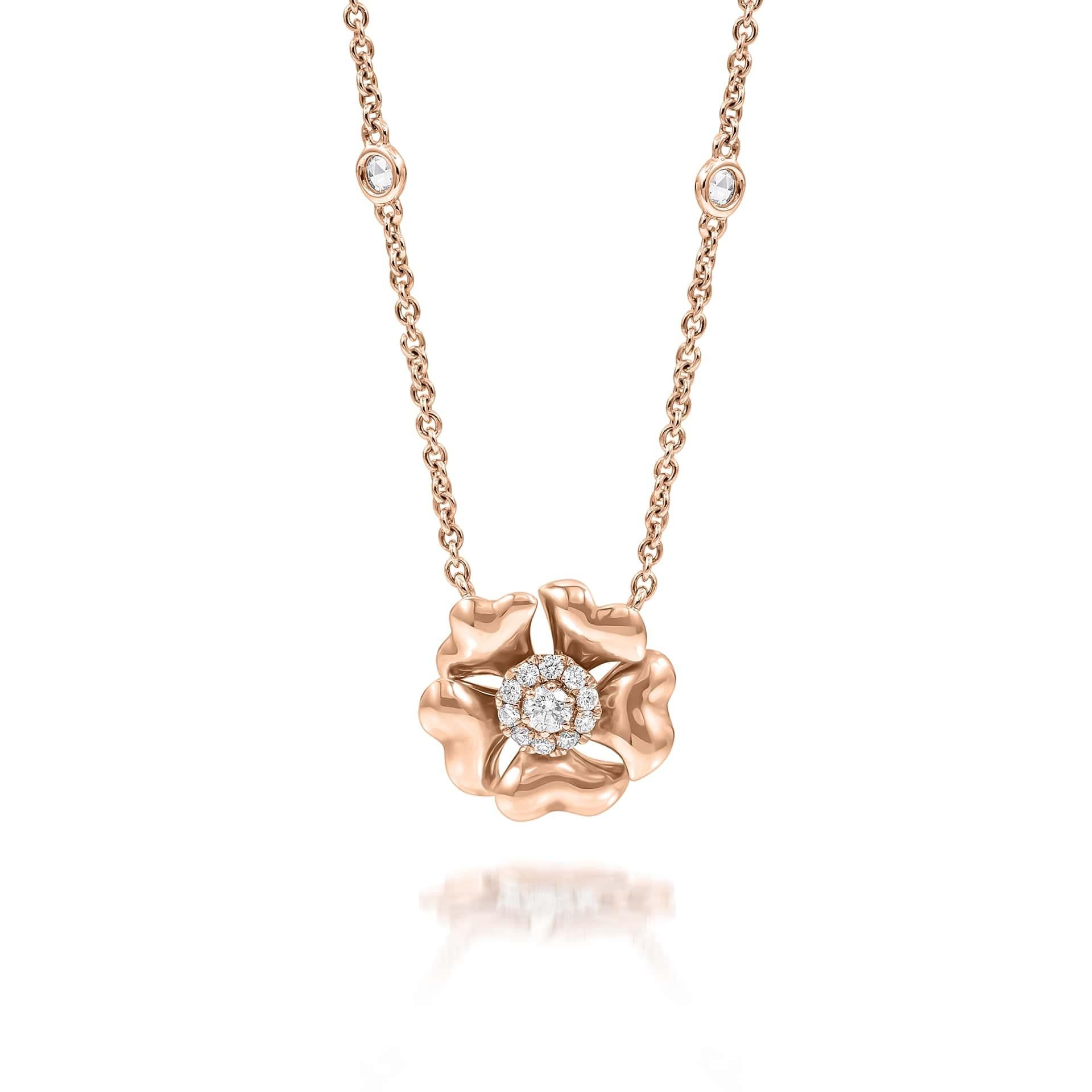 Bloom Gold and Diamond Flower Halo Necklace in 18K Rose Gold

Inspired by the exquisite petals of the alpine cinquefoil flower, the Bloom collection combines the richness of diamonds and precious metals with the light versatility of this delicate,
