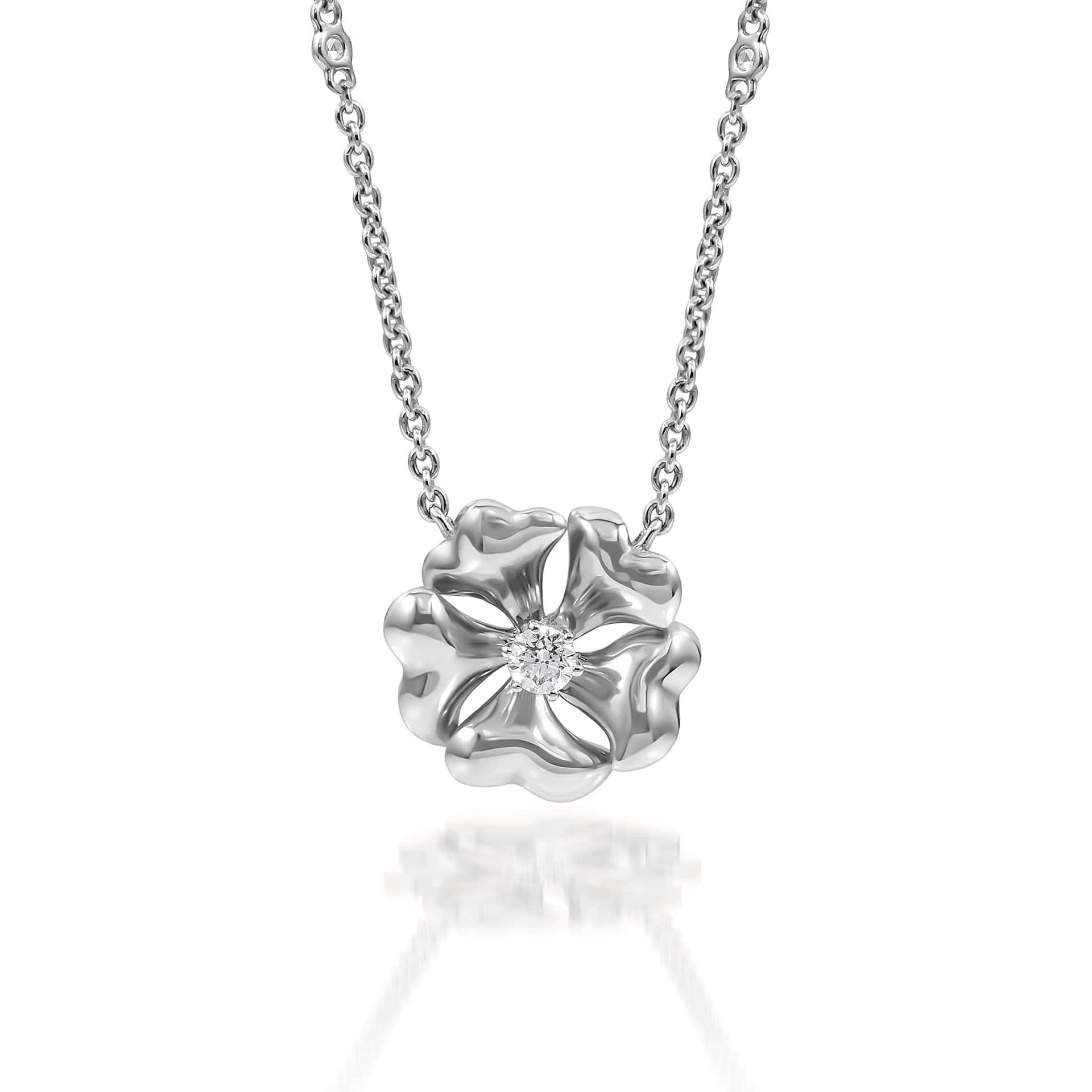 Bloom Gold and Diamond Flower Necklace in 18K White Gold

Inspired by the exquisite petals of the alpine cinquefoil flower, the Bloom collection combines the richness of diamonds and precious metals with the light versatility of this delicate,