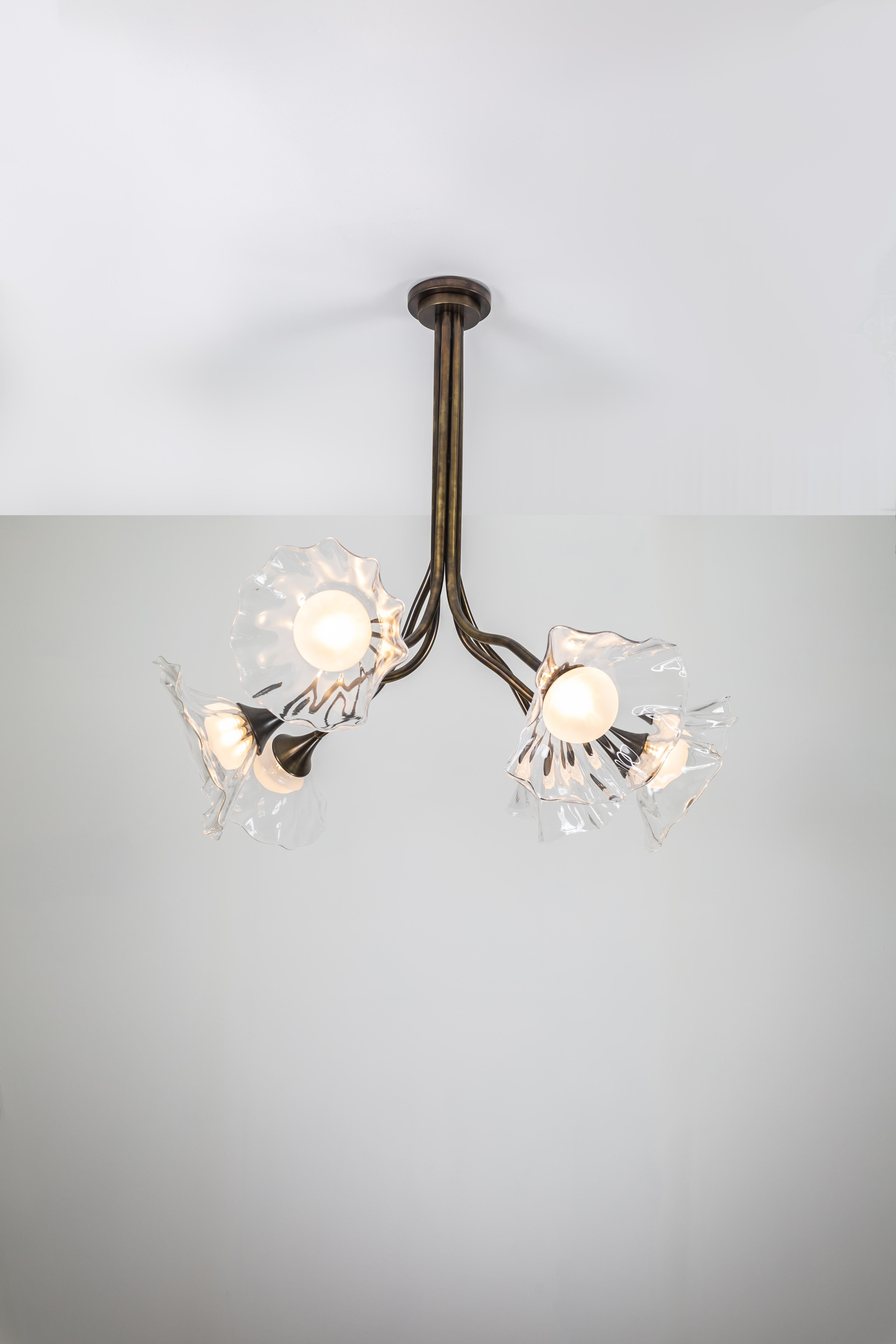 Kalin Asenov designs and fabricates lighting in Savannah, GA. Asenov works with a team of artisans and manufacturers to prototype and build all pieces in his studio.

The clear organic inspiration of Bloom is juxtaposed to the machined brass