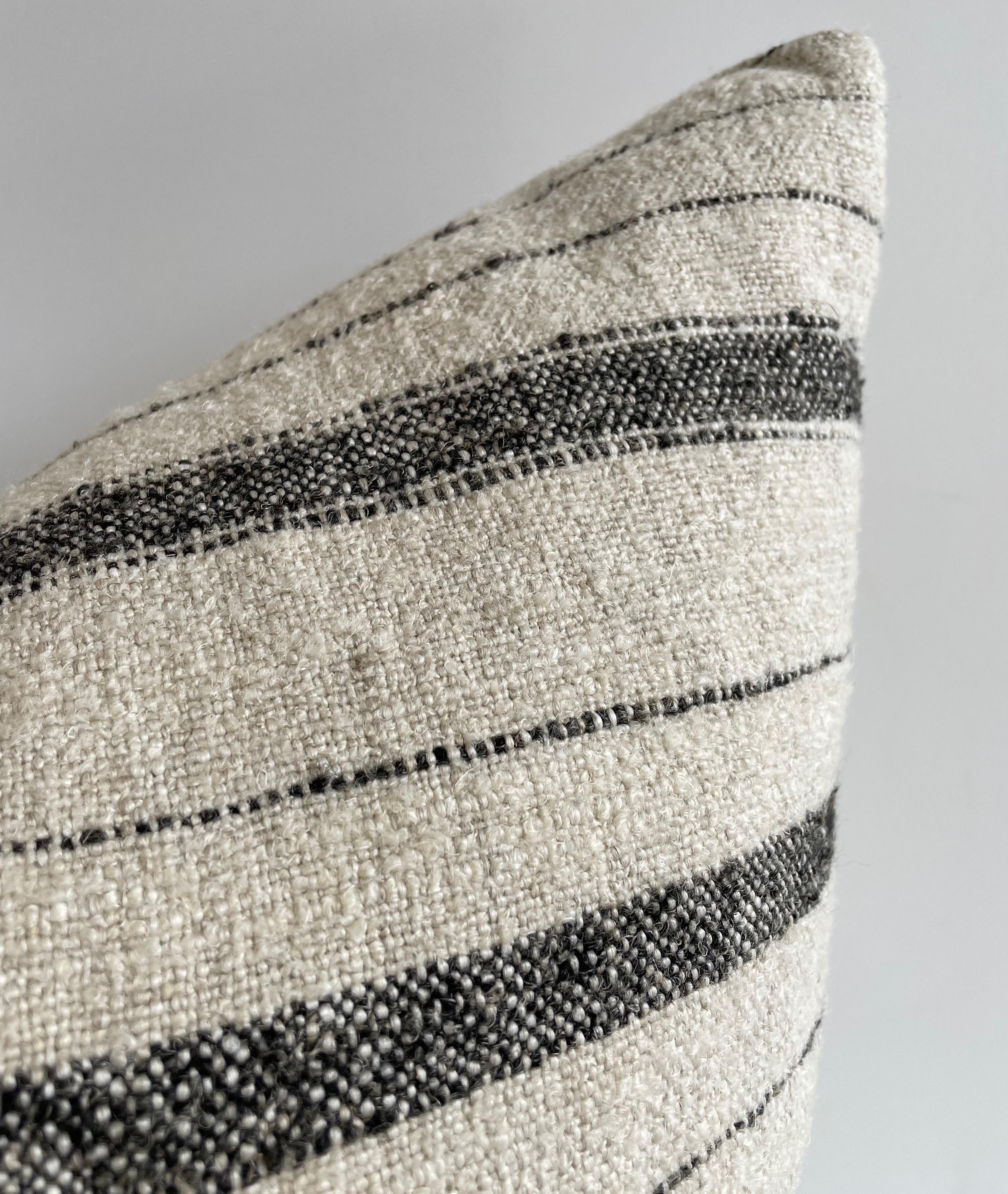Woven in Belgium using traditional weaving techniques, Bloom Home Inc Natalie features a Belgian Linen warp and alternating Belgian Linen/Mixed Fiber weft. This pillow feature a horizontal non repeating stripe. Includes insert. 

Color: Natural and