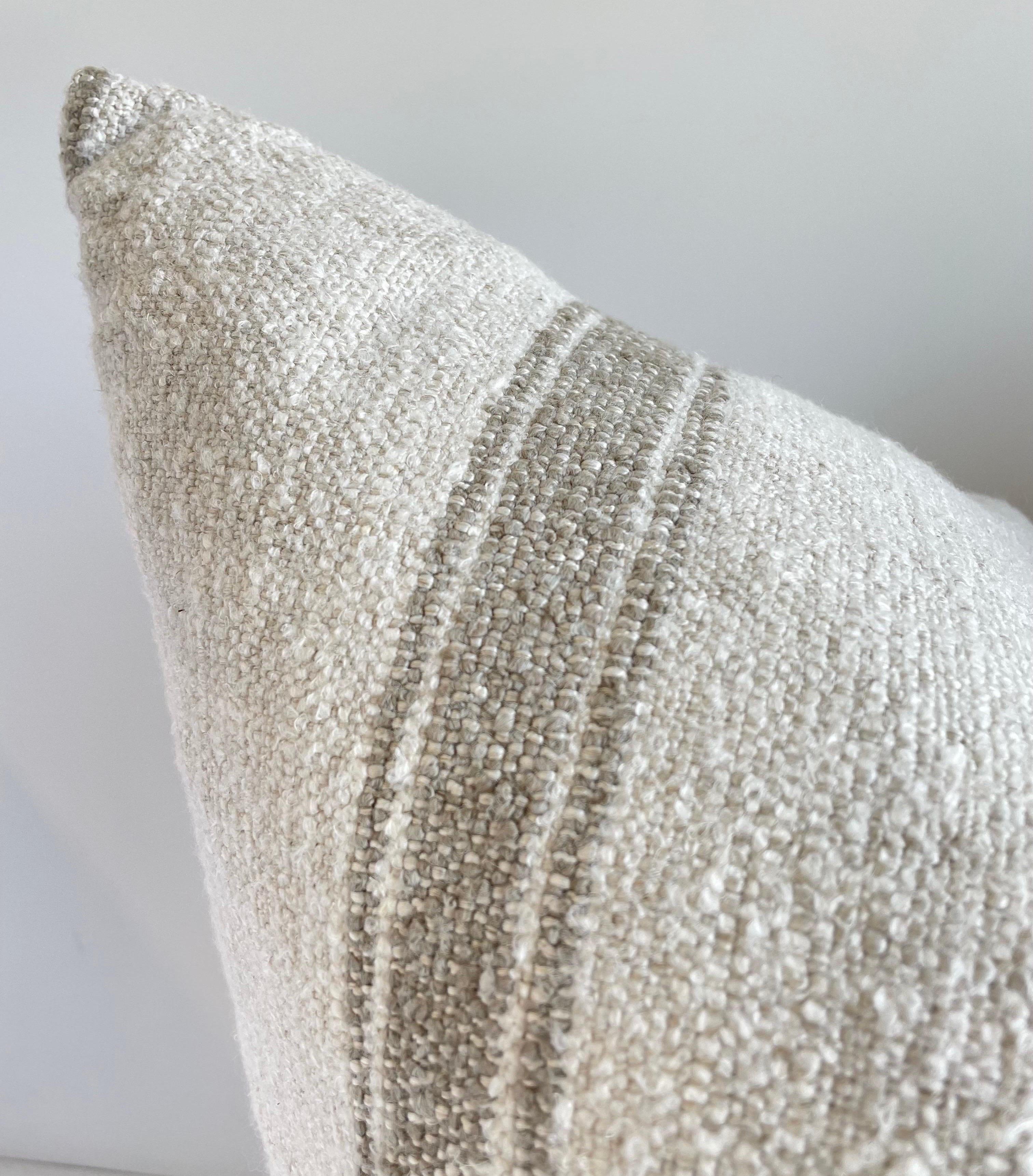 Woven in Belgium using traditional weaving techniques, Bloom Home Inc. Daisy features a Belgian Linen warp and alternating Belgian Linen/Mixed Fiber weft. The alternating wefts create a stripe that plays with both texture and color. These pillows
