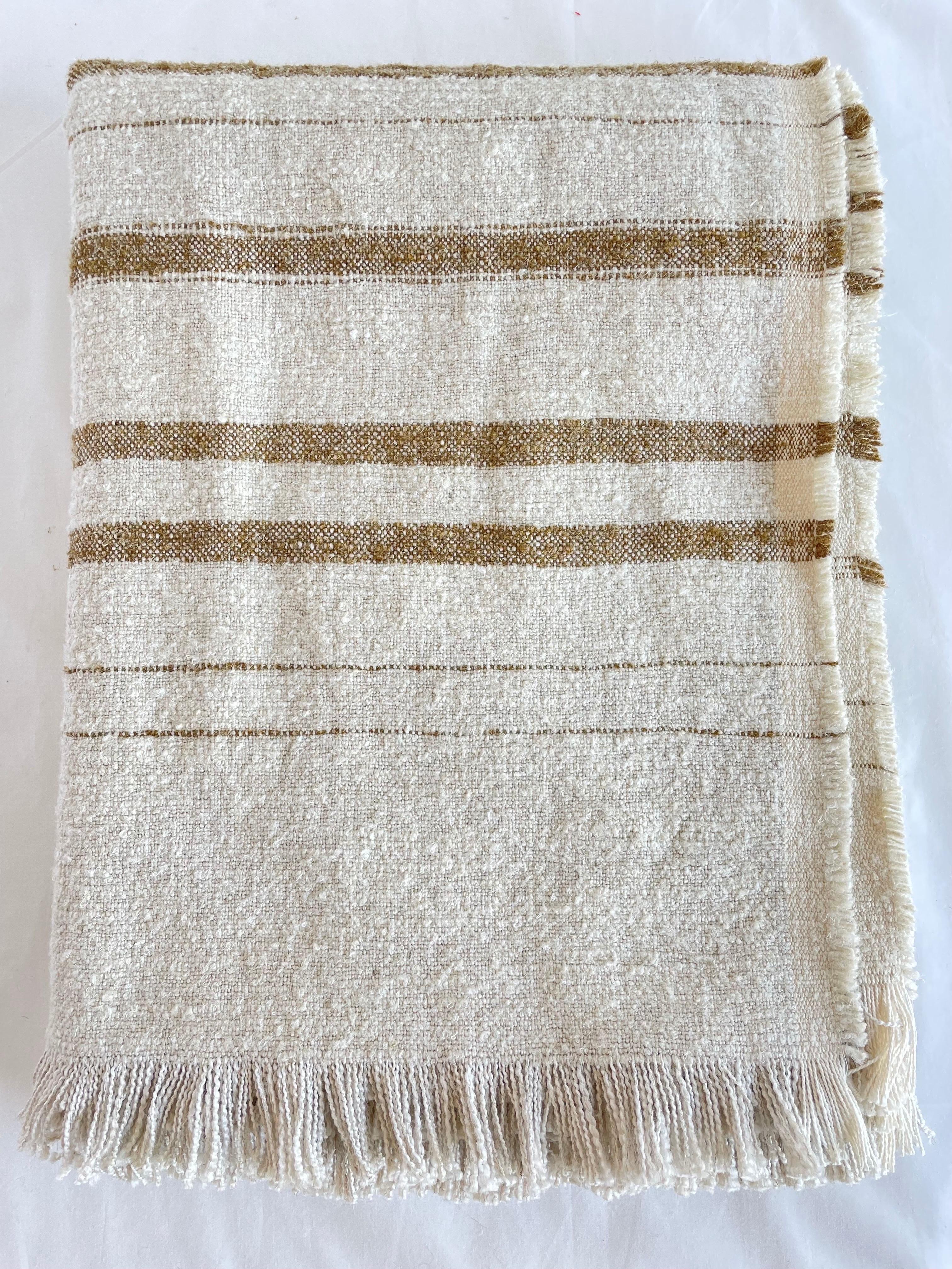 Woven in Belgium using traditional weaving techniques, Bloom Home Inc's Natalie throw features a Belgian Linen warp and alternating Belgian Linen/Mixed Fiber weft. The alternating wefts create a stripe that plays with both texture and
