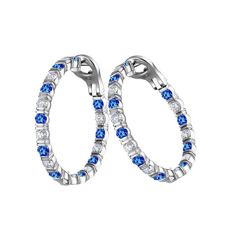 Embrace timeless sophistication with our Bloom Hoop Earrings. These stunning earrings are a celebration of elegance, combining luxurious gemstones and meticulous craftsmanship.

Features:

Blue Sapphires: 2.20 carats total weight
Diamonds: 2.20