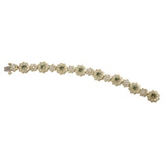 Bloom in Brilliance 6.67ct green garnet and 4.72ct diamonds
