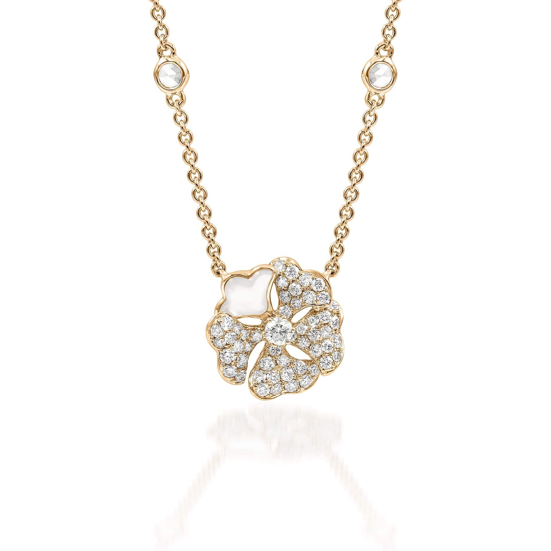 Bloom Pavé Diamond and Mother-of-Pearl Flower Necklace in 18K Yellow Gold

Inspired by the exquisite petals of the alpine cinquefoil flower, the Bloom collection combines the richness of diamonds and precious metals with the light versatility of