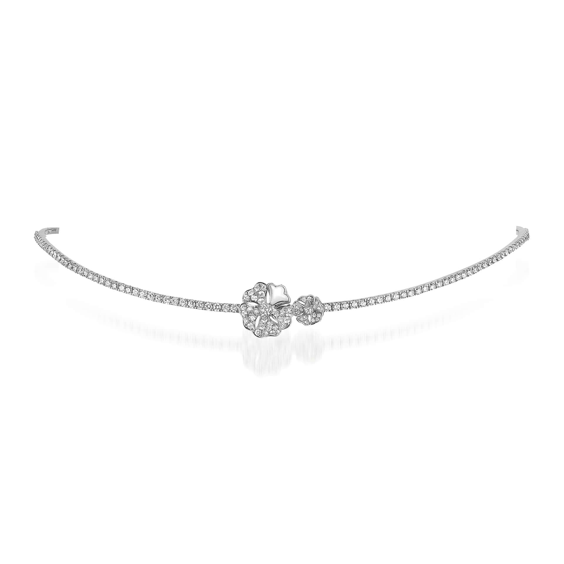 Bloom Pavé Diamond Flower Duo Choker with Mother-of-Pearl in 18K White Gold

Inspired by the exquisite petals of the alpine cinquefoil flower, the Bloom collection combines the richness of diamonds and precious metals with the light versatility of