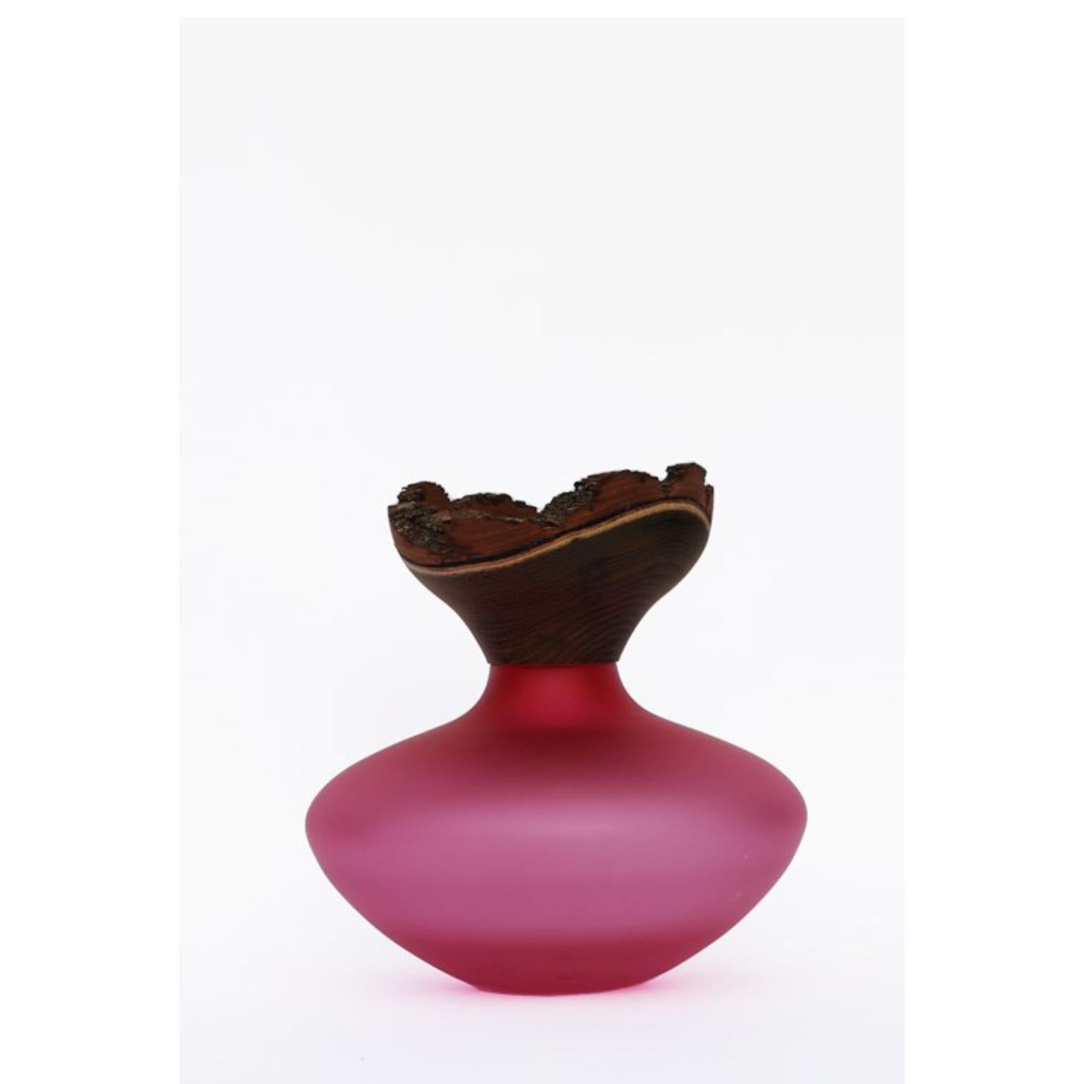 Bloom Stacking Satin Pink Vessel by Pia Wüstenberg
Unique Piece. Handmade In Europe.
Dimensions: Ø 26 x H 26 cm.
Materials: Acacia wood and glass.

Available in different color options. Available in a satin or glossy finish.

Pia Wüstenberg is a