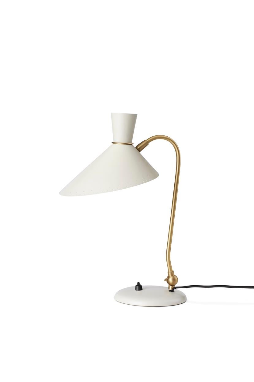Bloom Warm White Table Lamp by Warm Nordic
Dimensions: D20 x W29 x H42 cm
Material: Lacquered steel, Brass
Weight: 2 kg
Also available in different colours. Please contact us.

A little table lamp with great personality, designed in the 1950s