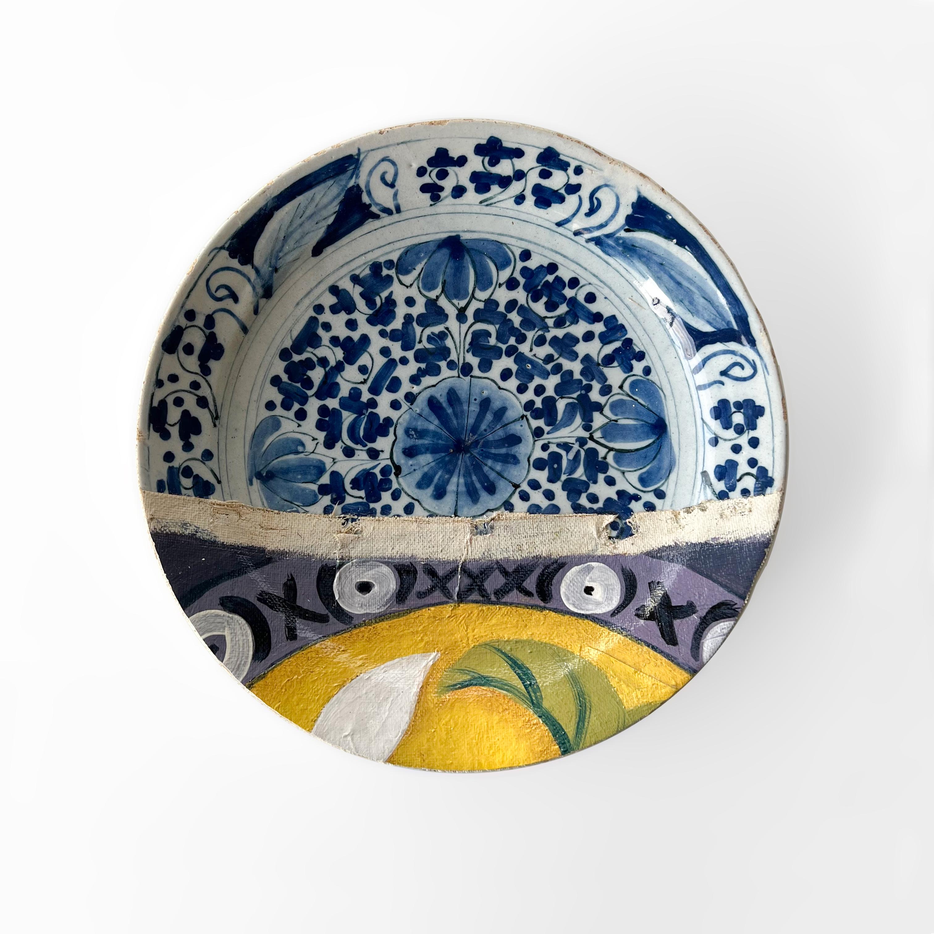 “Bloomsbury” includes several hand painted Blue & White plates, among which a rare 18th C. plate with a peony motif from De Lampetkan pottery (1609-1811) in Delft; a 20th C. plate with Peacock Feather motif; a Delfts Blue plate from the Porceleyne