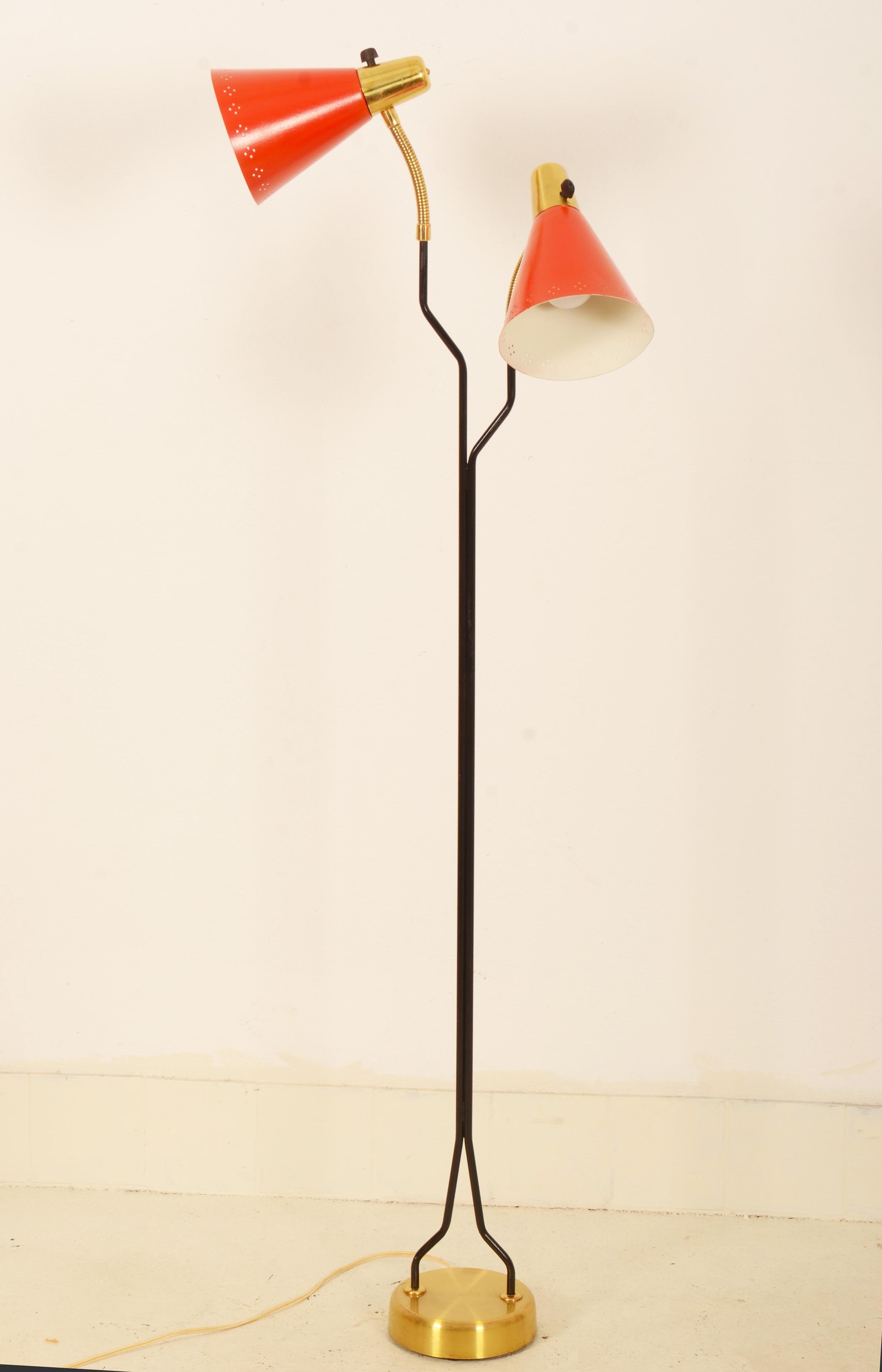 Cast iron base, two arms with goose neck fitted with E27 bakelite sockets and laquered aluminum lamp shades. Designed in Sweden in the 1960s.