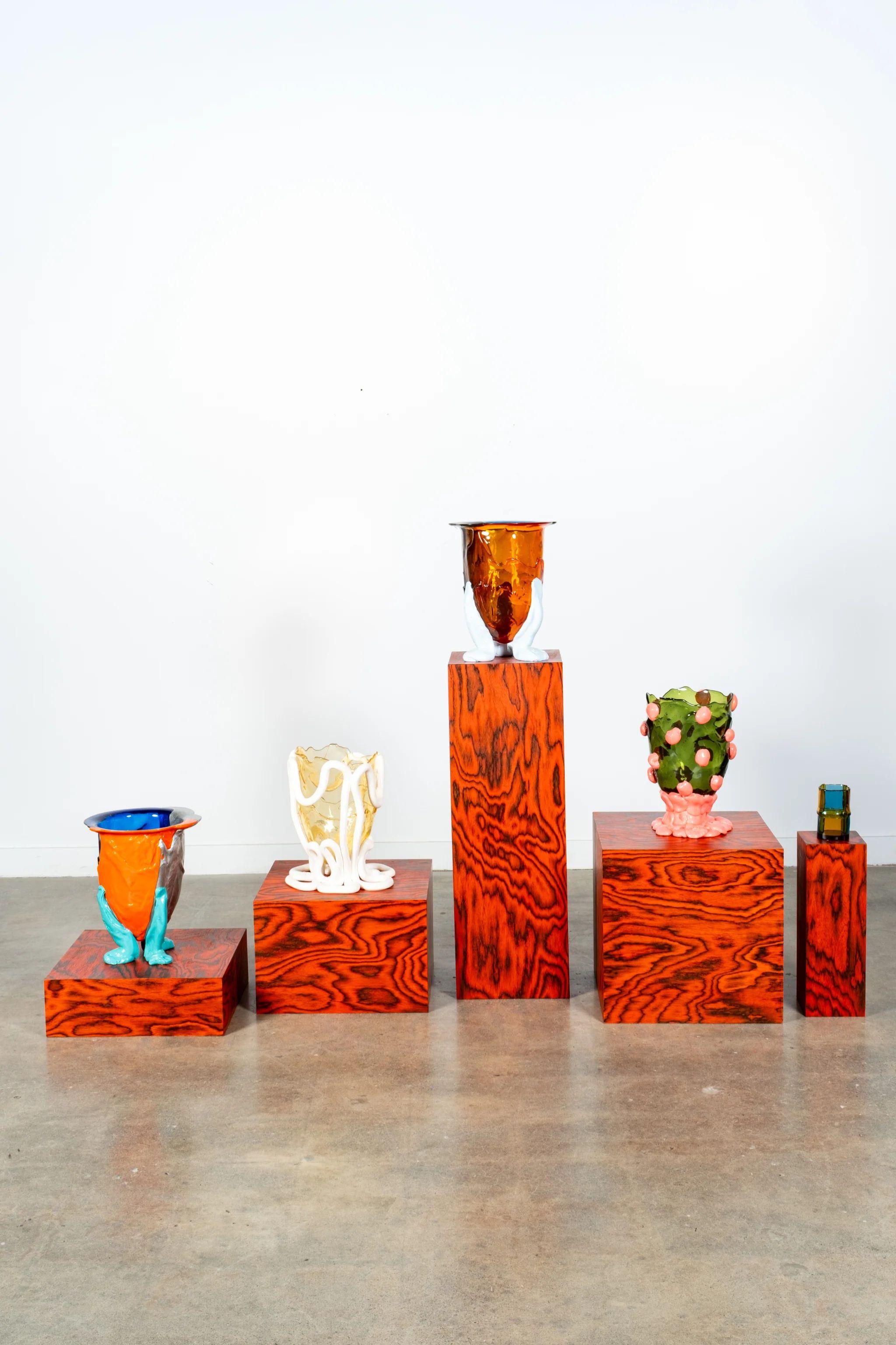Designed By Bonne Choice Using Ettore Sottsass Veneer.

The veneer created by Ettore Sottsass in the 1980s – utilized for the first
time in the Memphis collection – now becomes part of the Bonne Choice
Bloques range in three color variants: red,
