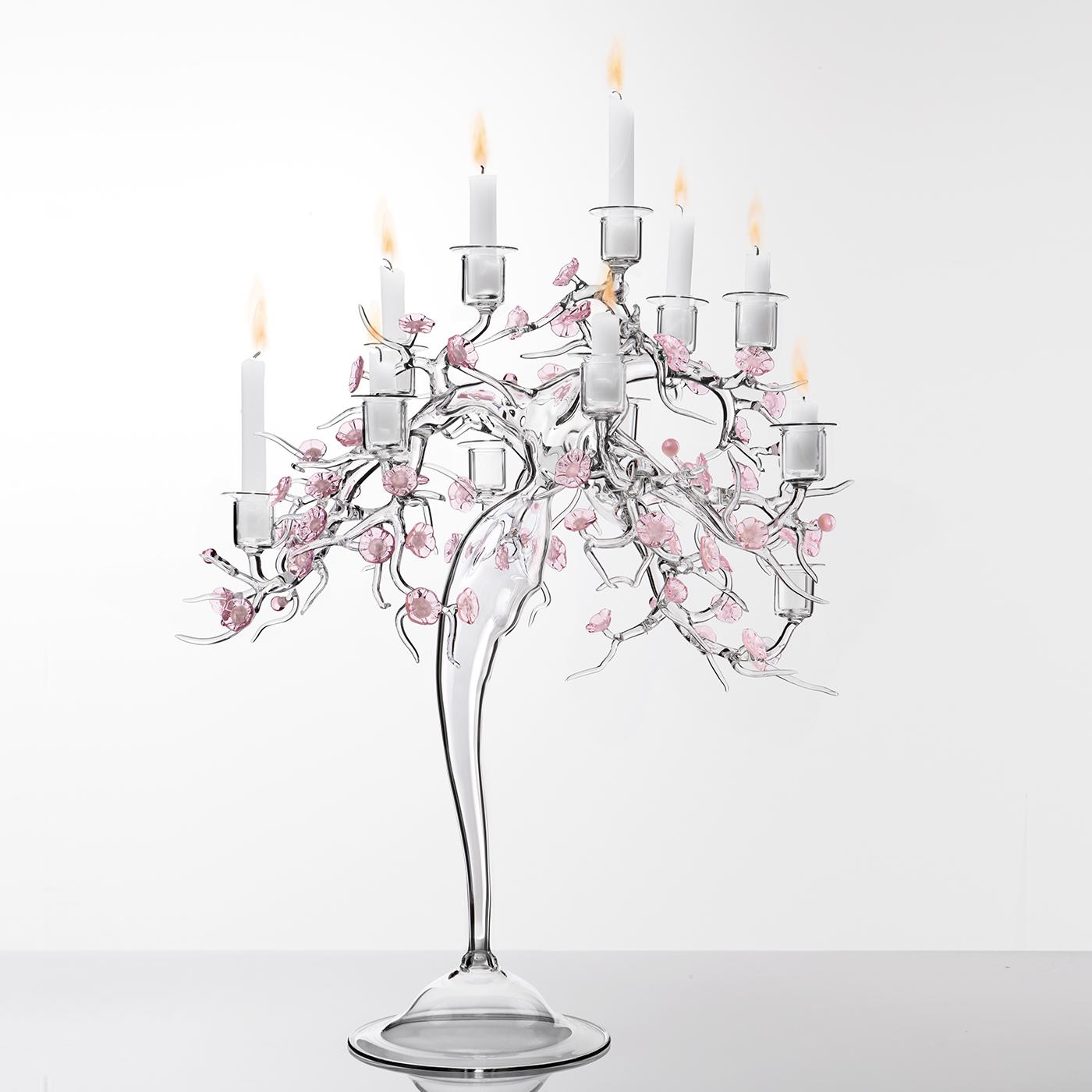 Defined by powerful aesthetic impact, this exclusive borosilicate glass-blown candelabra was handcrafted using Crestani's trademark technique of flame-working. Inspired by the Japanese cherry blossom, this objet d'art showcases elaborated branches