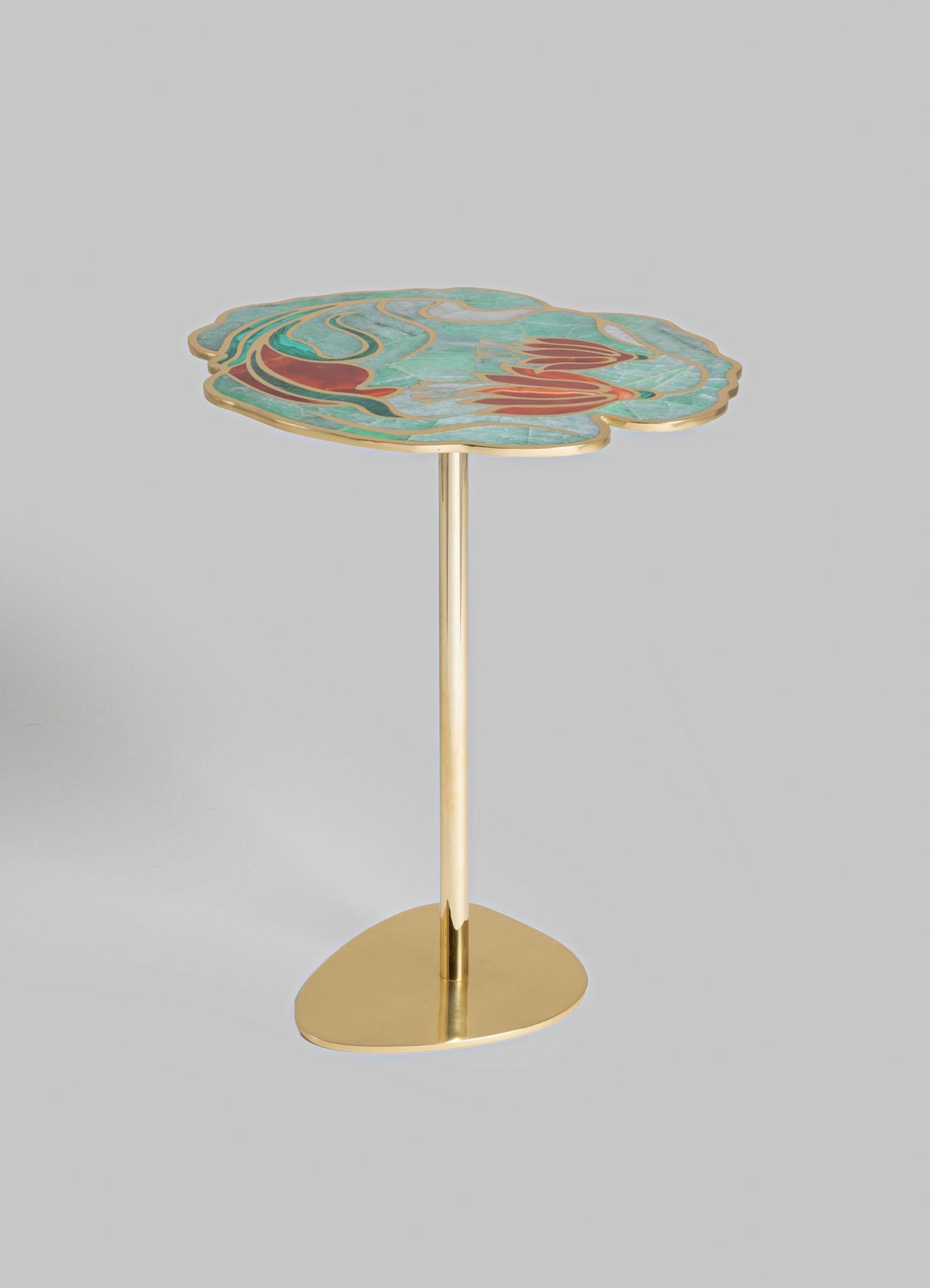 Blossom Side Table Large in Brass & Semi Precious Stone, Viya by Vikram

Boundless, vibrant, and imagined into existence, an Indian garden is summoned to the table. Here, the invited guests release singular scents of jasmine, lilac, and lotus