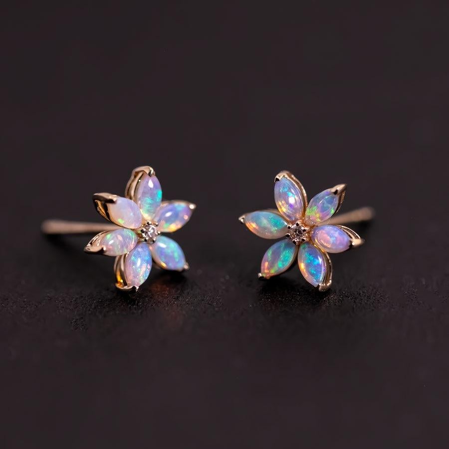 Blossom Stud Earrings Australian Solid Opal 14K Yellow Gold Diamond Accents.


Free Domestic USPS First Class Shipping!  Free One Year Limited Warranty!  Free Gift Bag or Box with every order!



Opal—the queen of gemstones, is one of the most