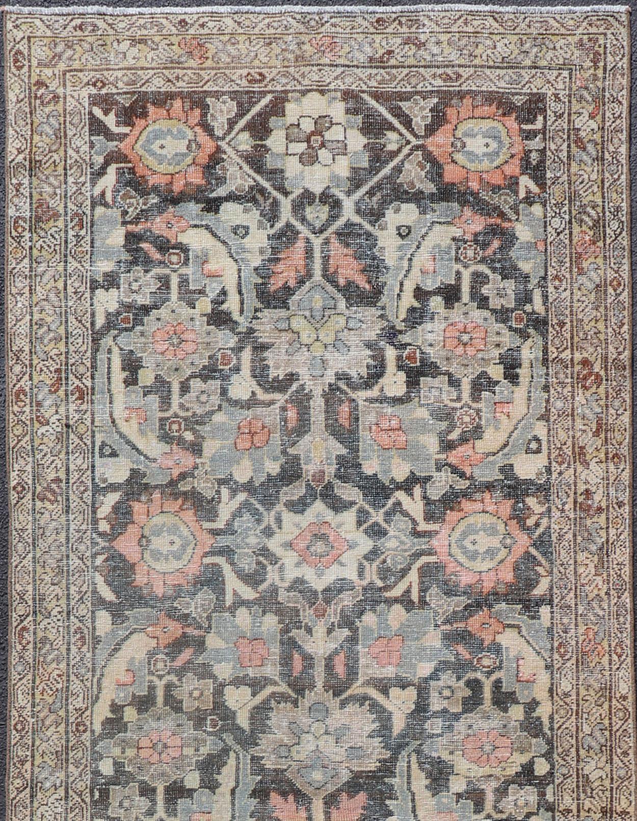Blossoming all over large scale Herati design antique Persian Sultanabad runner in brown, charcoal and D. gray field, Keivan Woven Arts/rug SUS-2012-927, country of origin / type: Iran / Sultanabad, circa 1920

Measures: 4'2 x 12'9

This