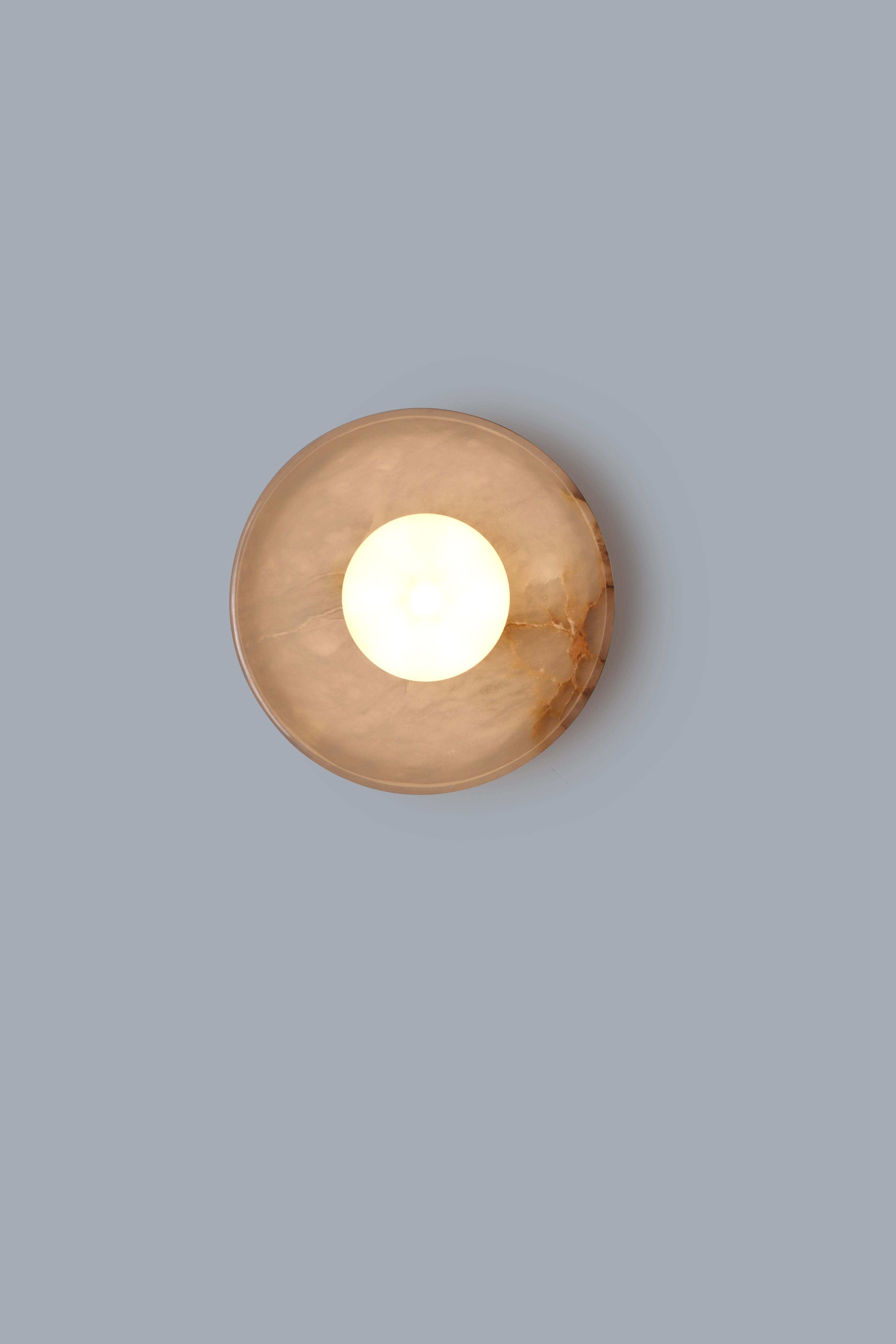 Blot Marble Dome Wall Sconce by Lamp Shaper
Dimensions: D 14 x W 23 x H 23 cm.
Materials: Brass, glass and marble.

Different finishes available: raw brass, aged brass, burnt brass and brushed brass Please contact us.

All our lamps can be wired