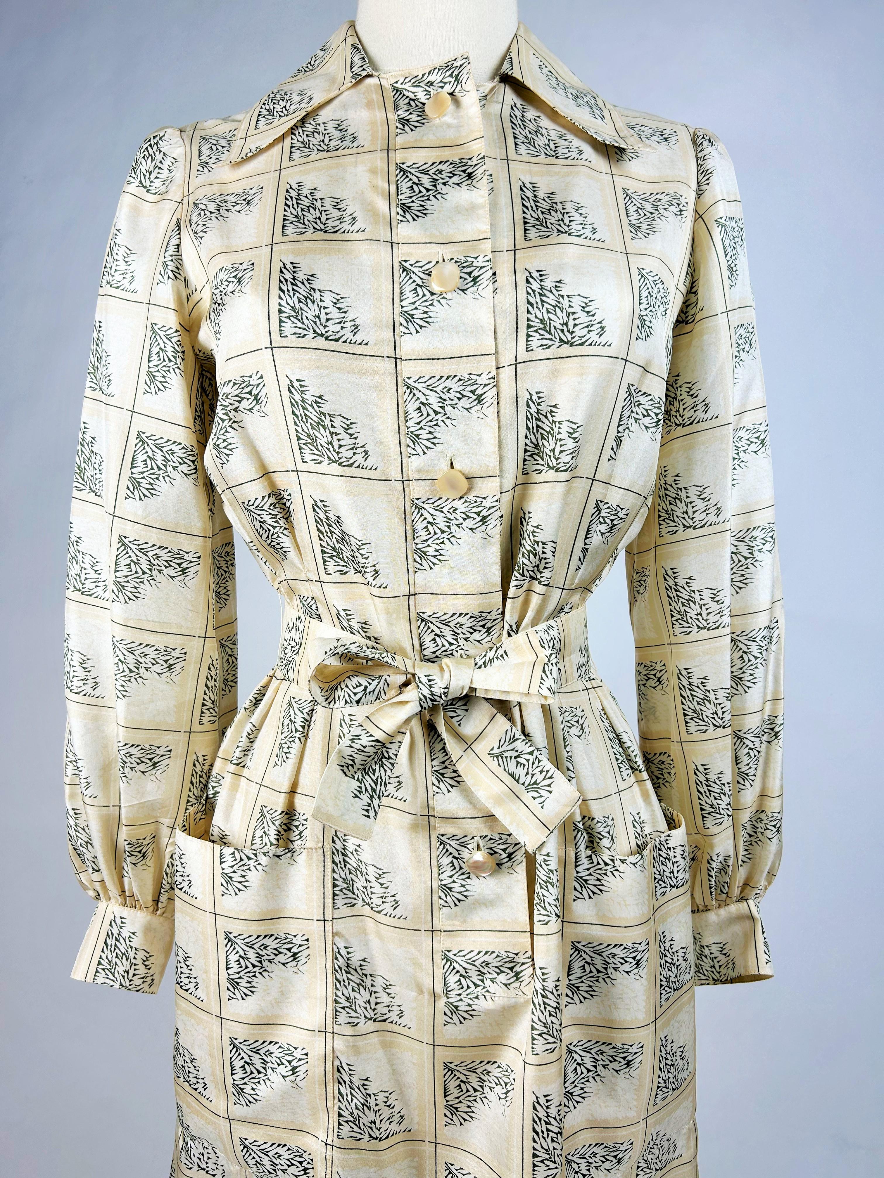 Circa 1985

France

Elegant day dress in Japanese-print silk taffeta by Gérard Pipart for Nina Ricci 