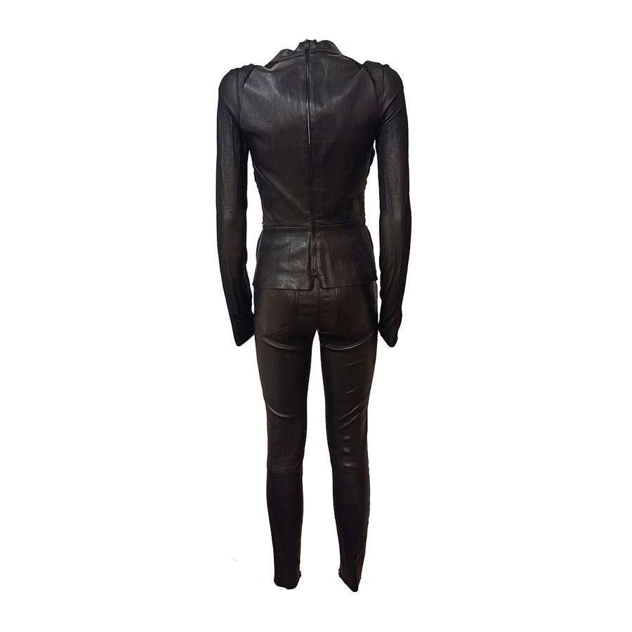 Lamb leather Black color Blouse : Shoulder / hem length cm 52 (204 inches) Four pockets pants Length cm 94 (37 inches) Waist cm 36 (141 inches) French size 36 italian 40
