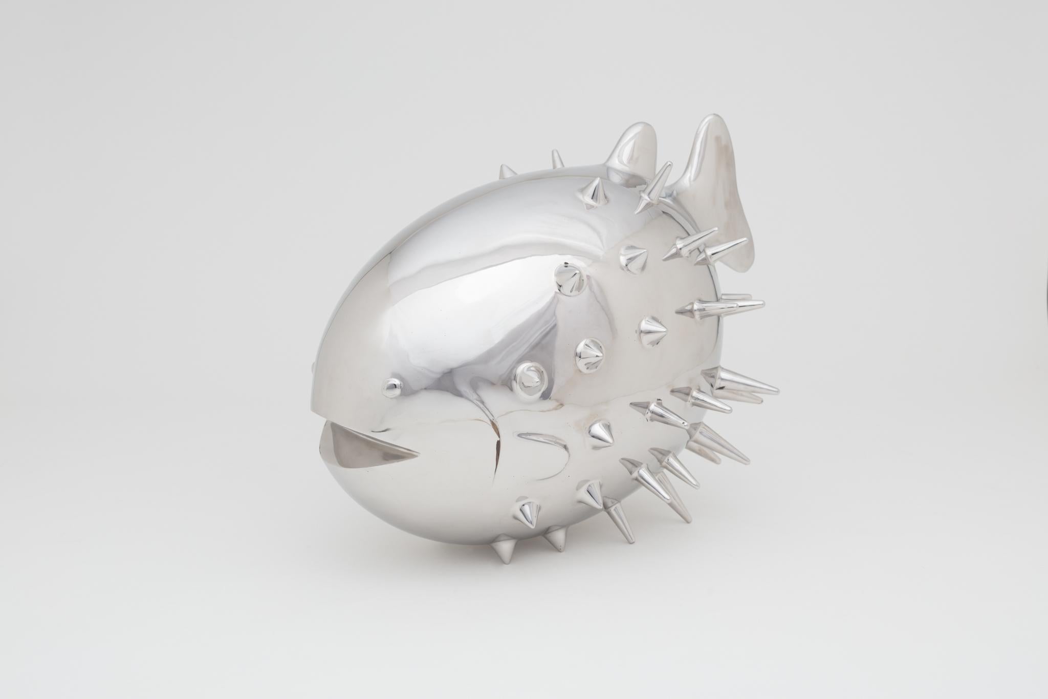 The large version of the mirror polished stainless steel Blowfish by renowed mexican artist Mizraim Cárdenas. This is one of the most interesting sculptures of the Michoacan-based sculptor, not only because its perfect rounded form, but also because