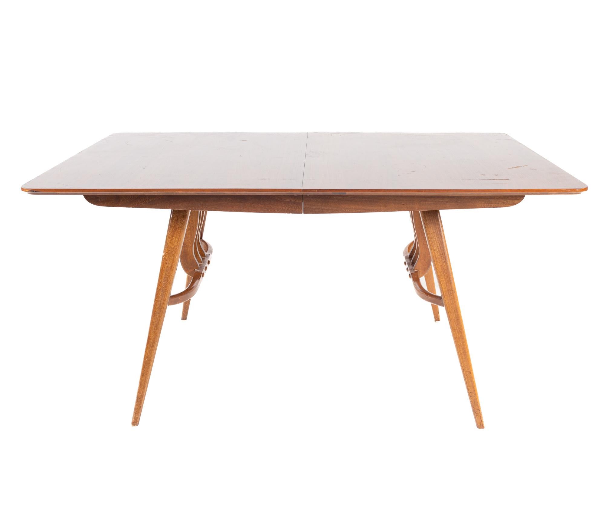 Blowing rock mid-century walnut dining table

This table measures: 60 wide x 42 deep x 30 inches high, with a chair clearance of 26 inches

All pieces of furniture can be had in what we call restored vintage condition. That means the piece is