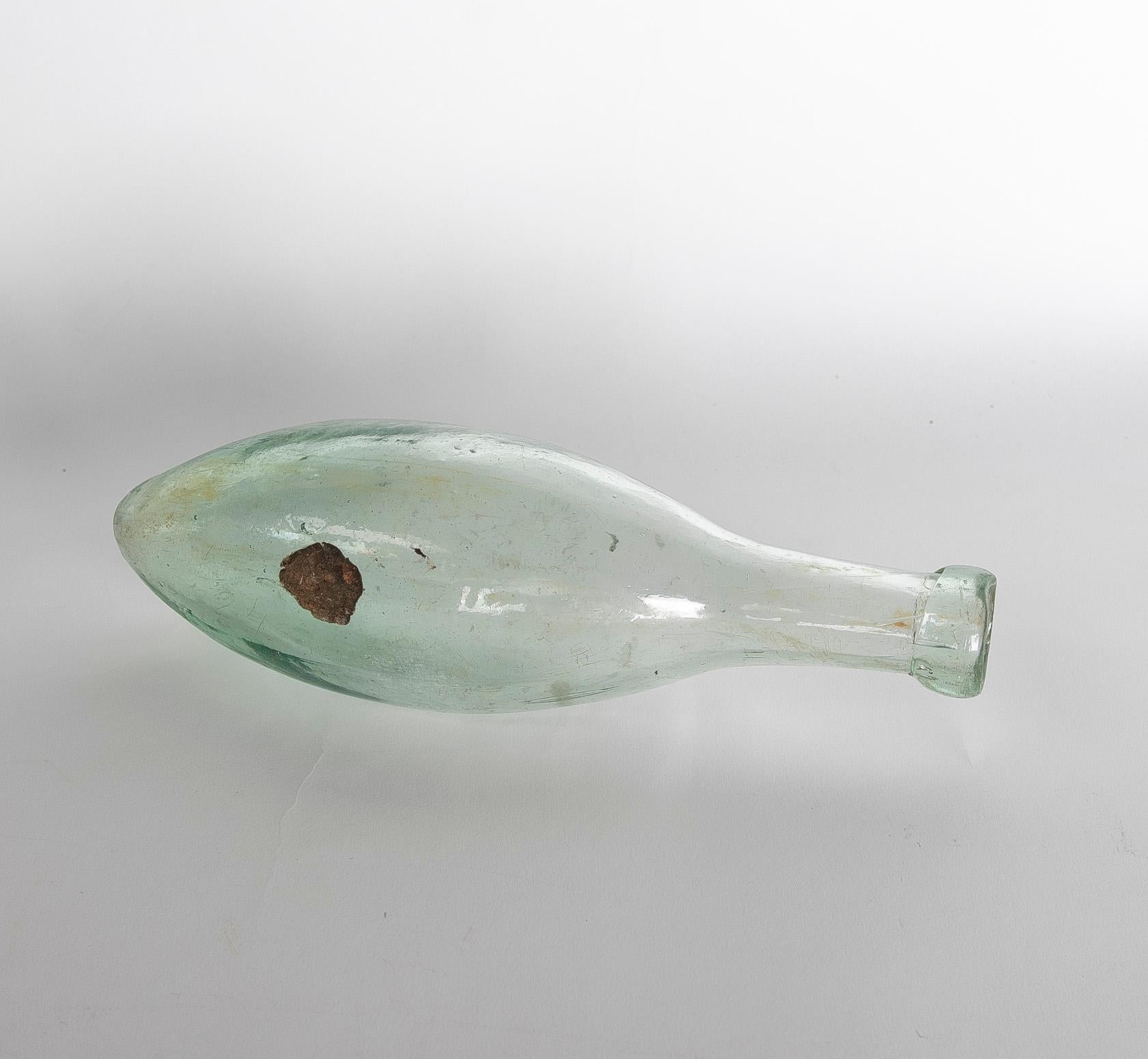 Blown Crystal Bottle with Elongated Shape.