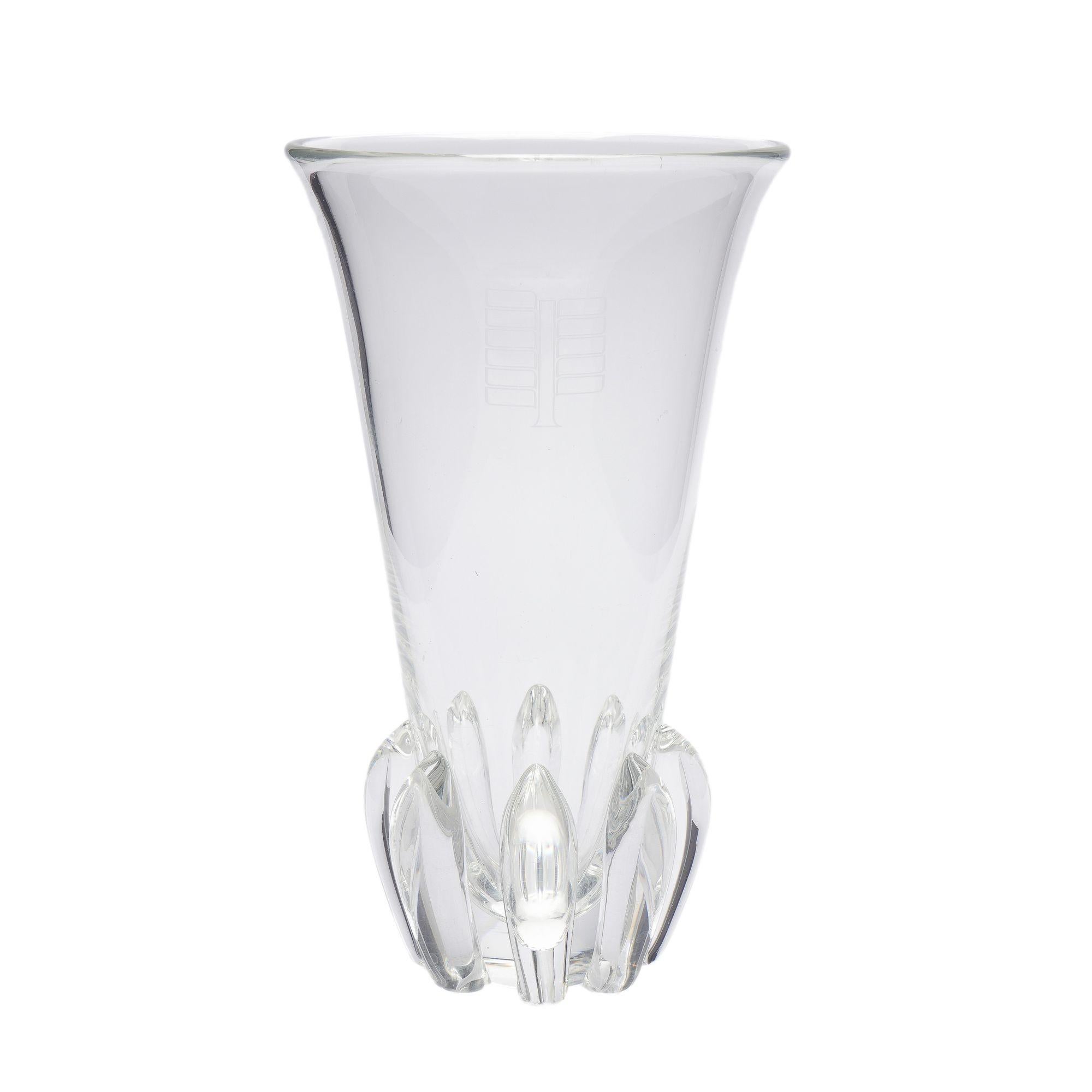 Blown, flaring body crystal vase with eight applied bulb ribs to the base. Designed by George Thompson for Steuben, titled, 
