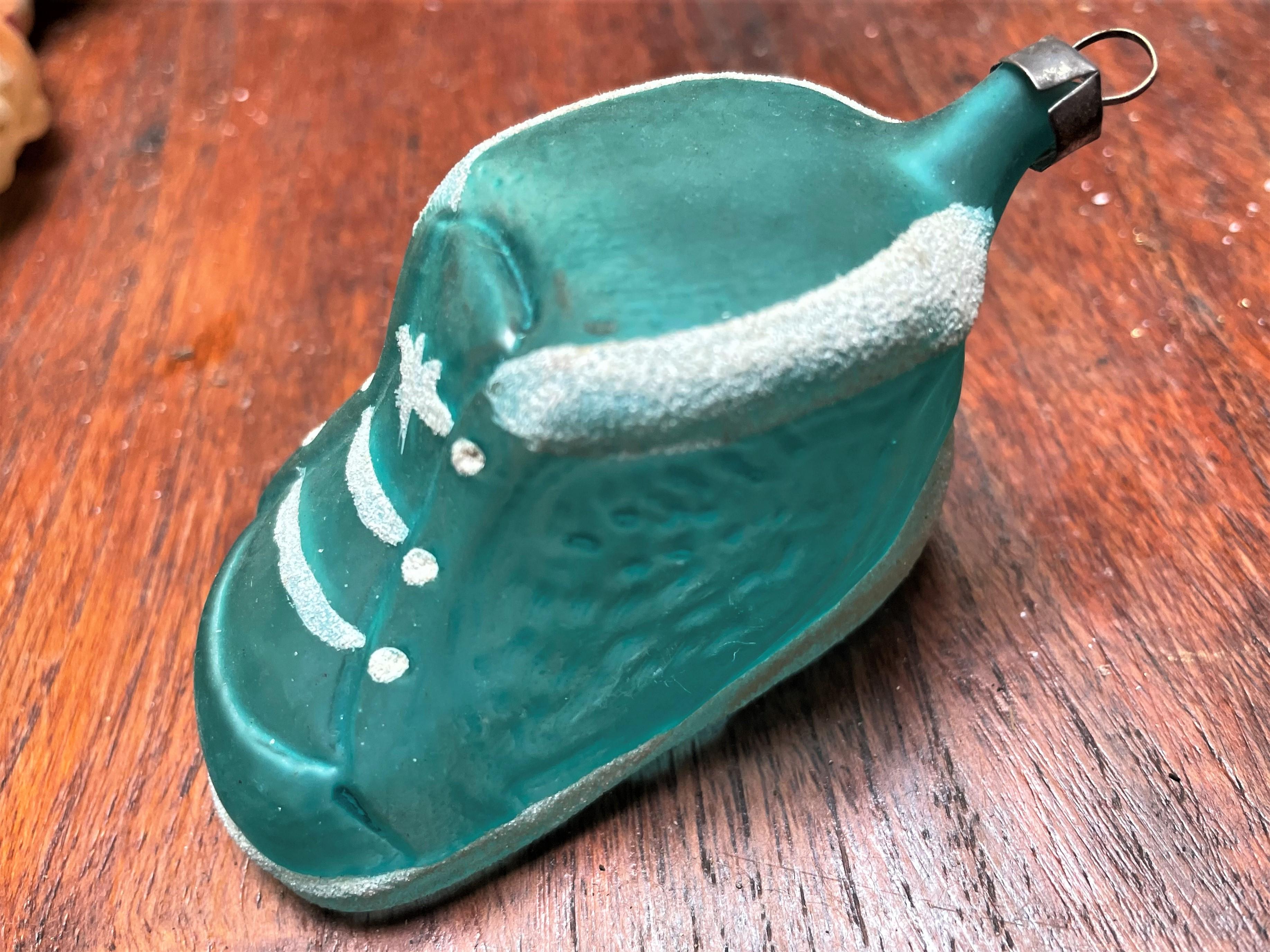 Folk Art Blown Glass Blue Baby Shoe/Boot Christmas Ornament w/ White Glitter Paint For Sale