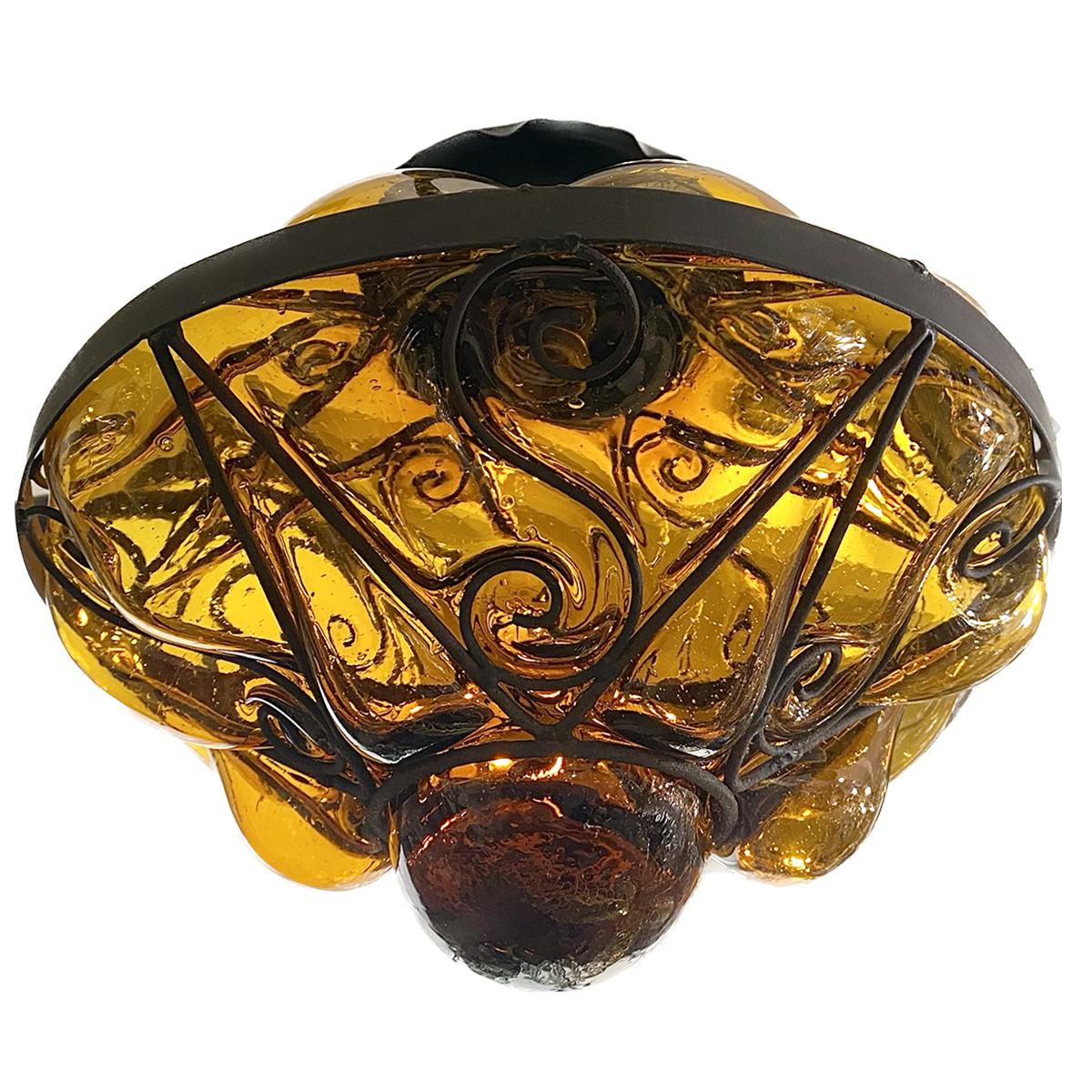 A circa 1950's Italian amber blown glass lantern.

Measurements:
Drop: 15