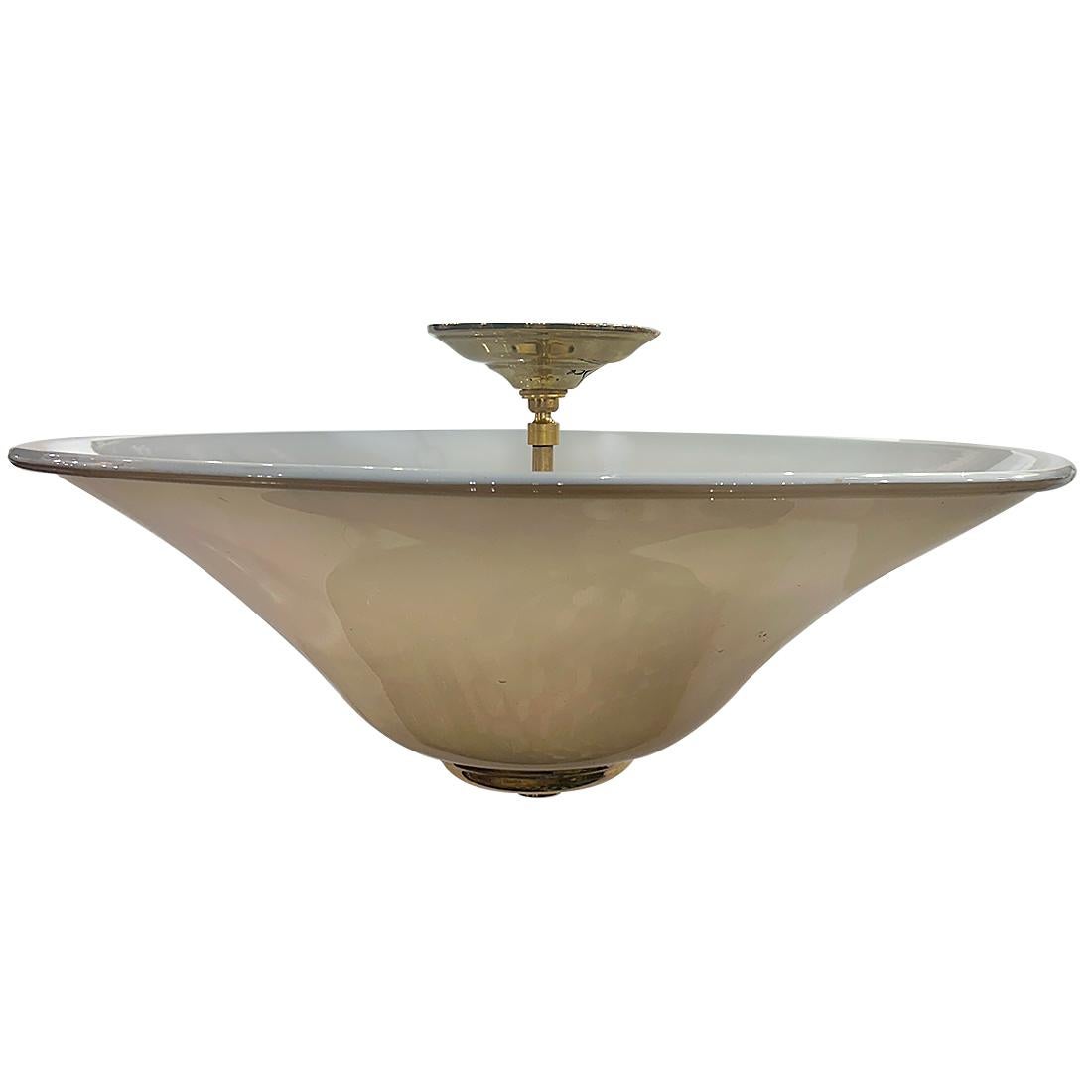 Una lámpara italiana de Murano soplado de hacia 1950 con 4 luces interiores de base candelabro.

Medidas:
Caída: 13
Diámetro: 23