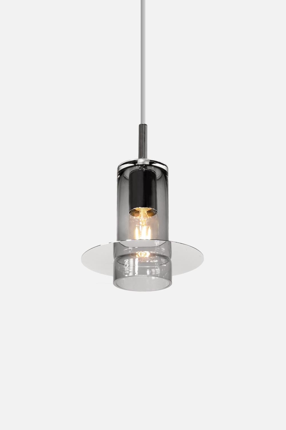 Blown glass pendant light by Eric Willemart
Materials: Grey blown glass, Polished silver or brass or copper Plating
Light specifications: Socket E27, Filament Bulb 20W (optional)
Ceiling rose: Silver or brass or copper-plated cylinder