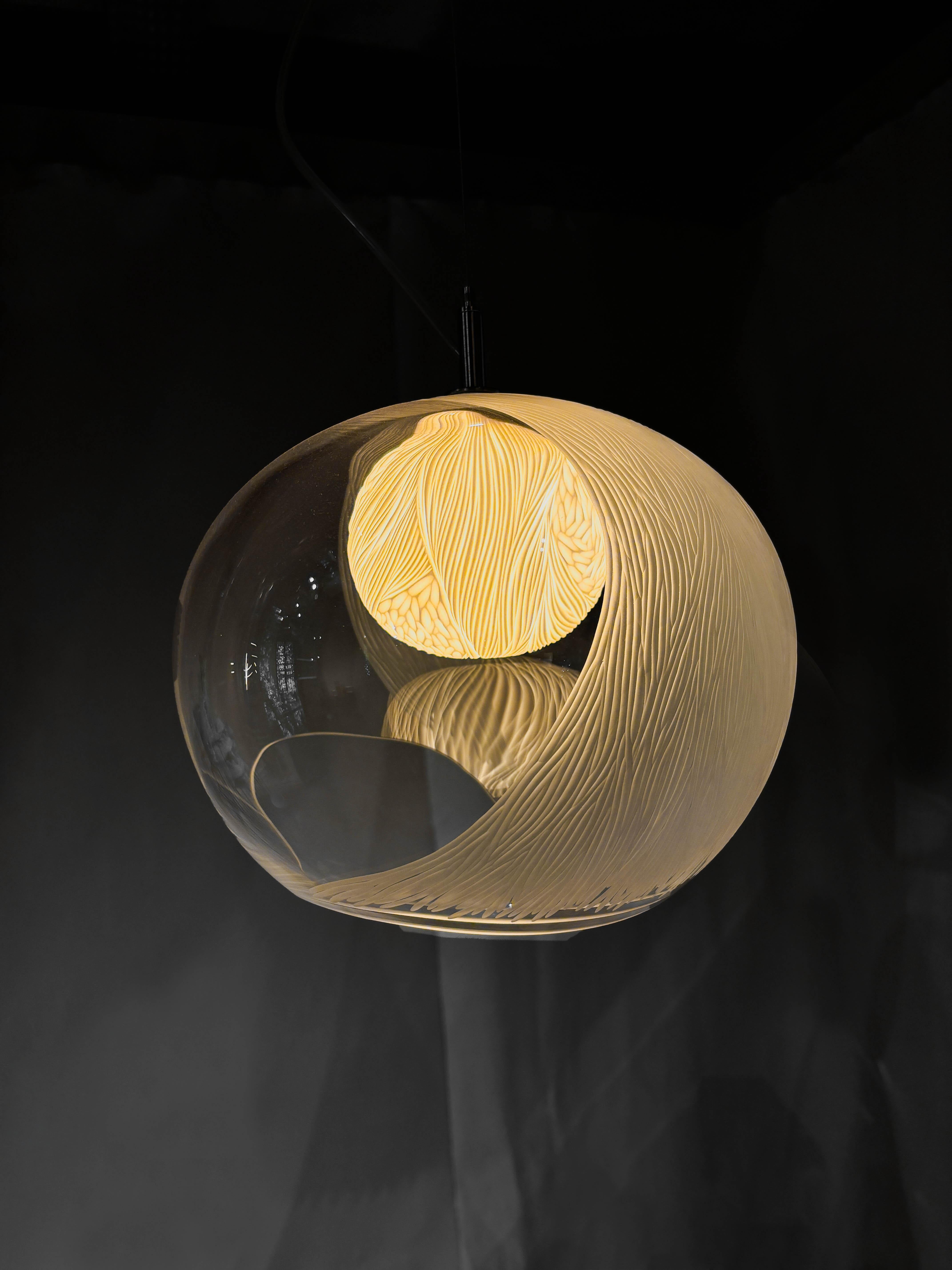 English Blown glass, porcelain engraved scultptural med pendant light by Vezzini & Chen For Sale