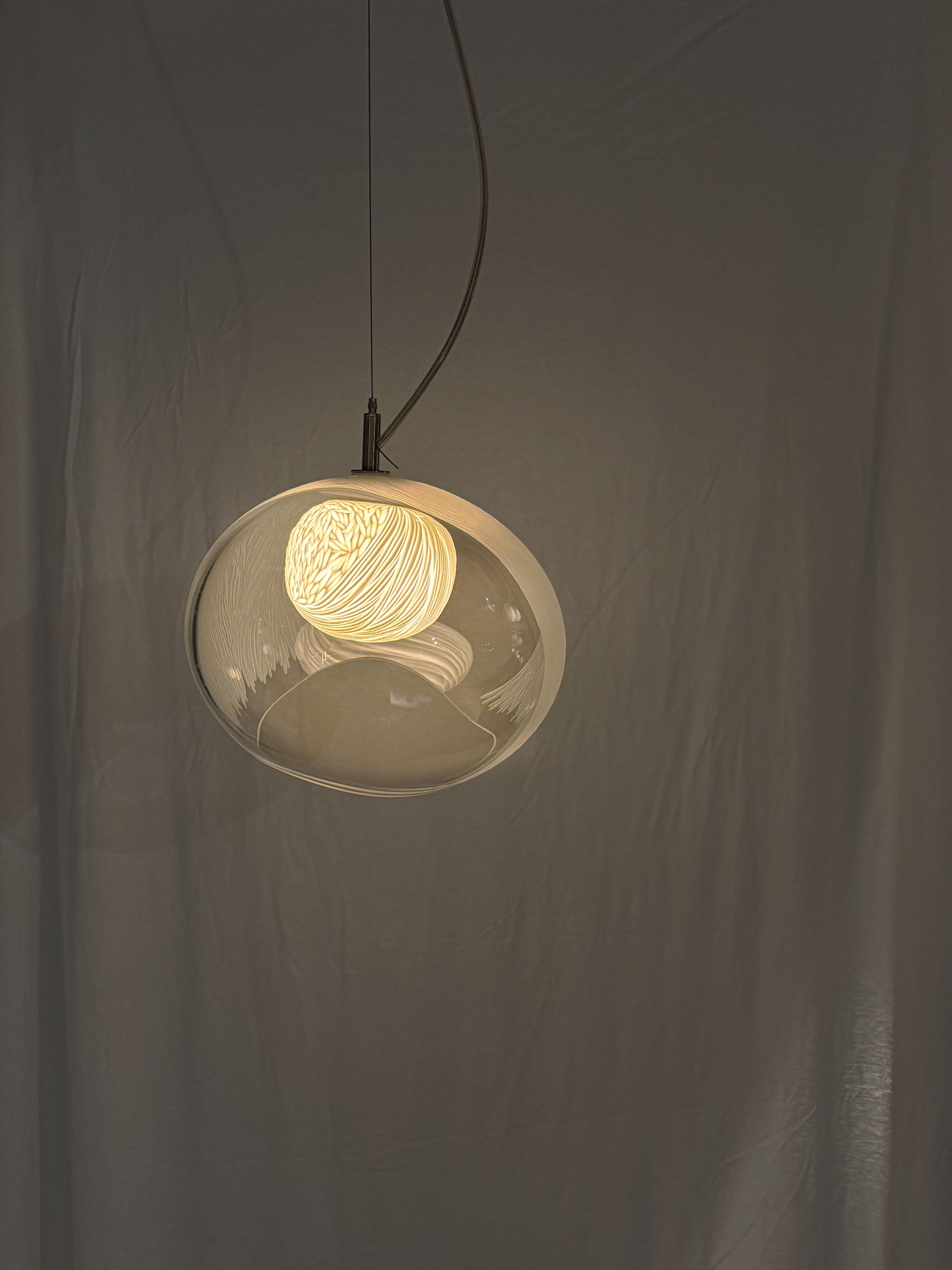 Evolve is a sculptural table light .

Seed has been a central theme for our work in the past 2 years.

Having created a Seed wall light collection, it seemed obvious to honour this theme in creating a Seed pod table light. Seed Light is born from