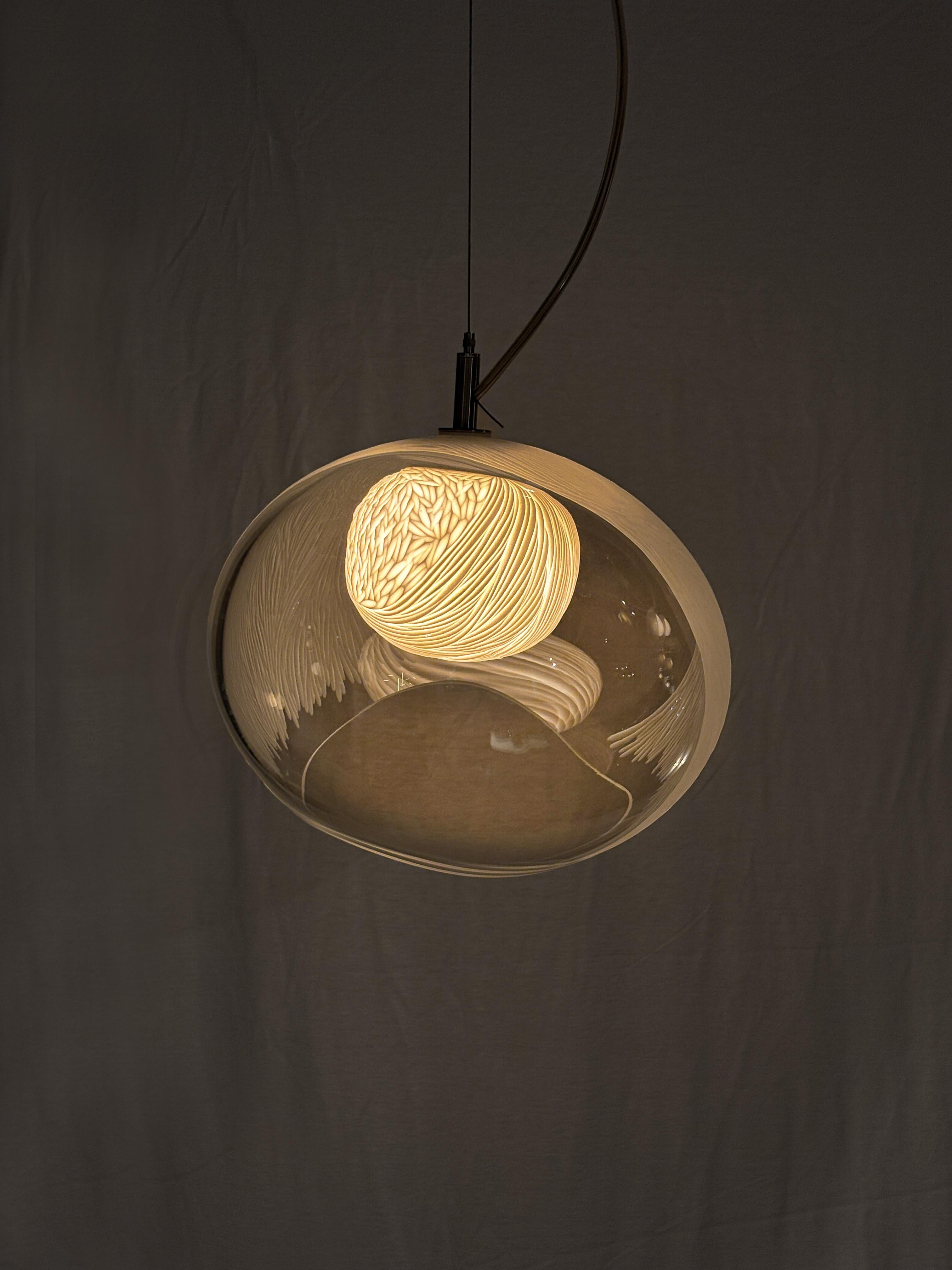 English Blown glass, porcelain engraved scultptural med2 pendant light by Vezzini & Chen For Sale