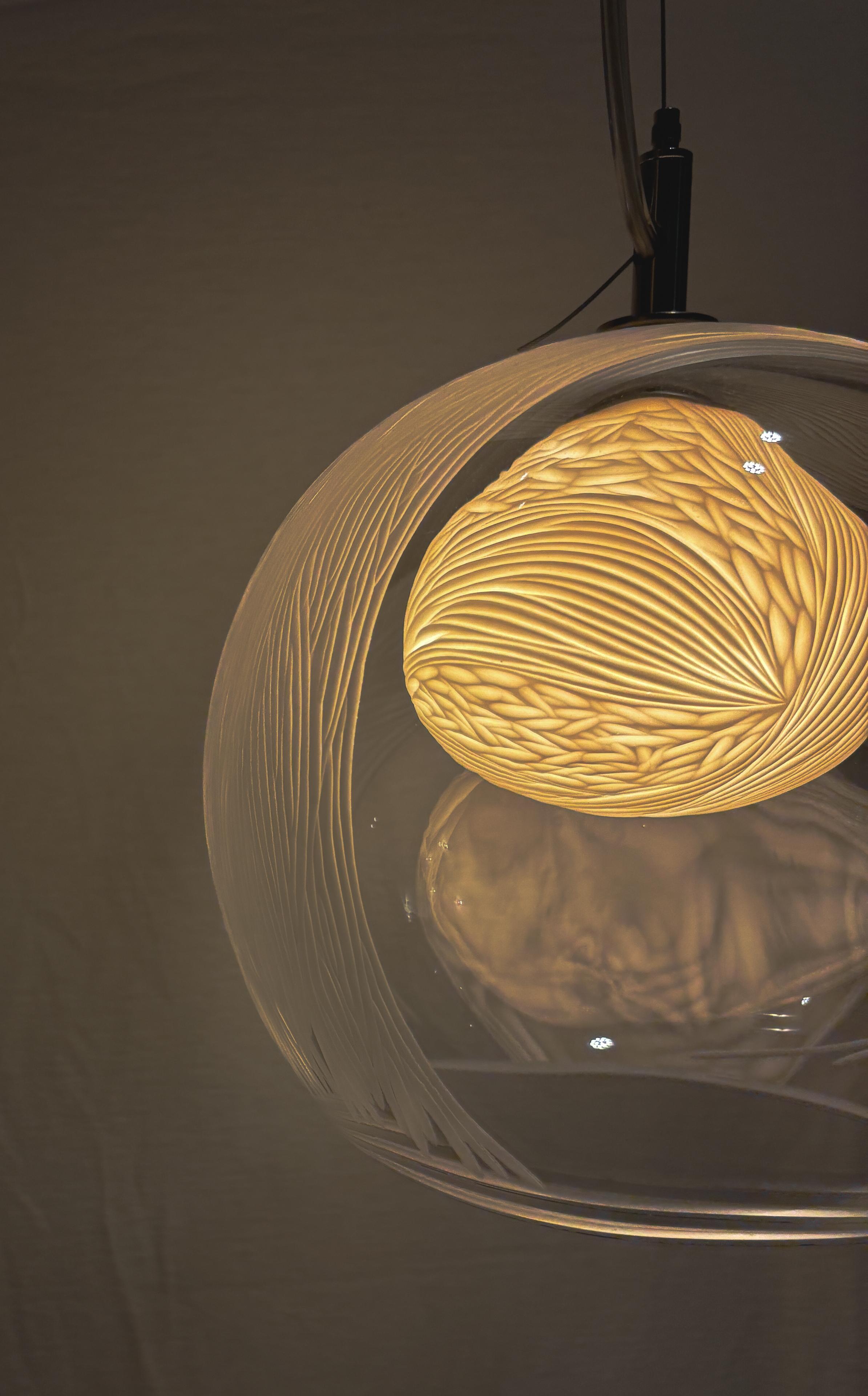 Engraved Blown glass, porcelain engraved scultptural mini pendant light by Vezzini & Chen For Sale