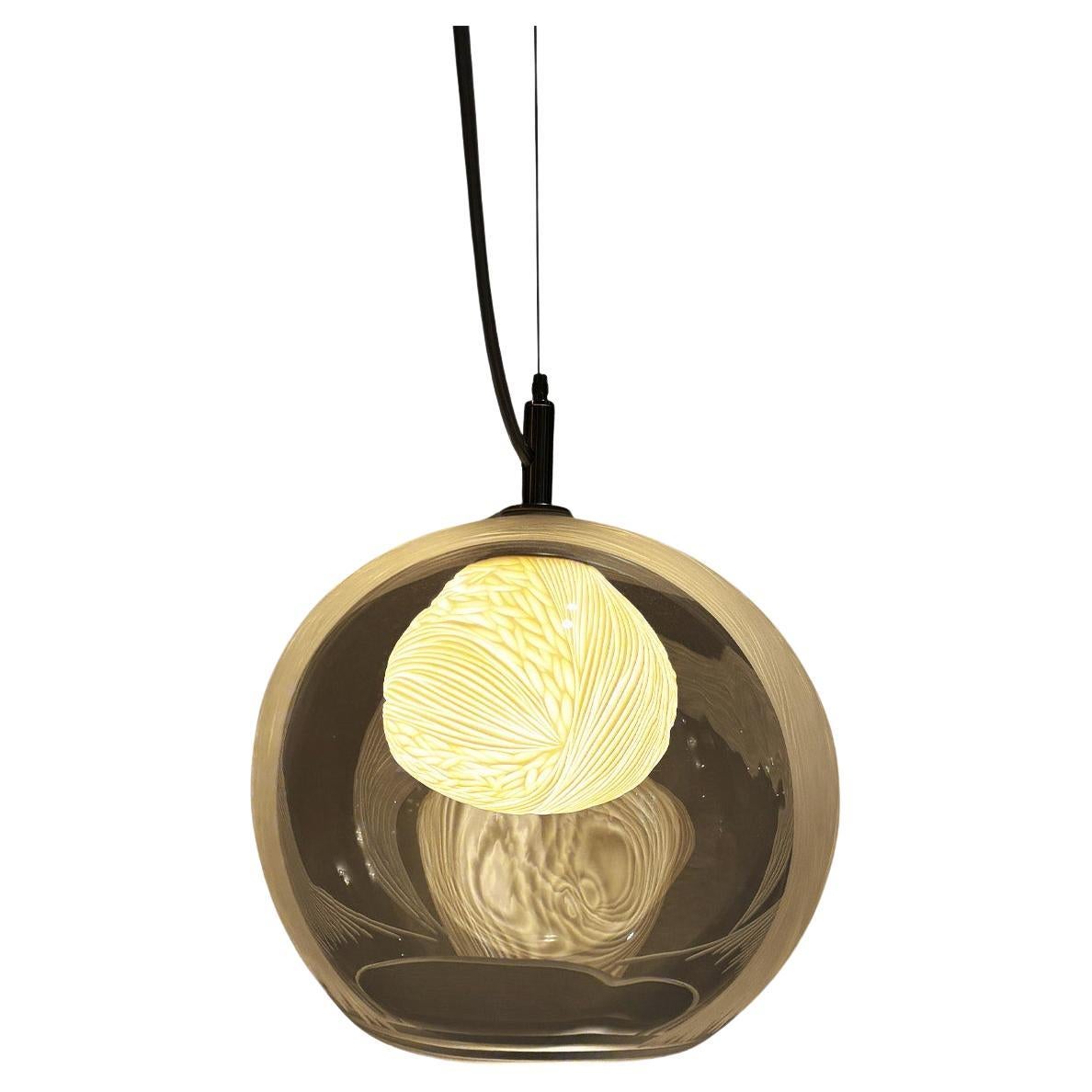 Blown glass, porcelain engraved scultptural mini pendant light by Vezzini & Chen