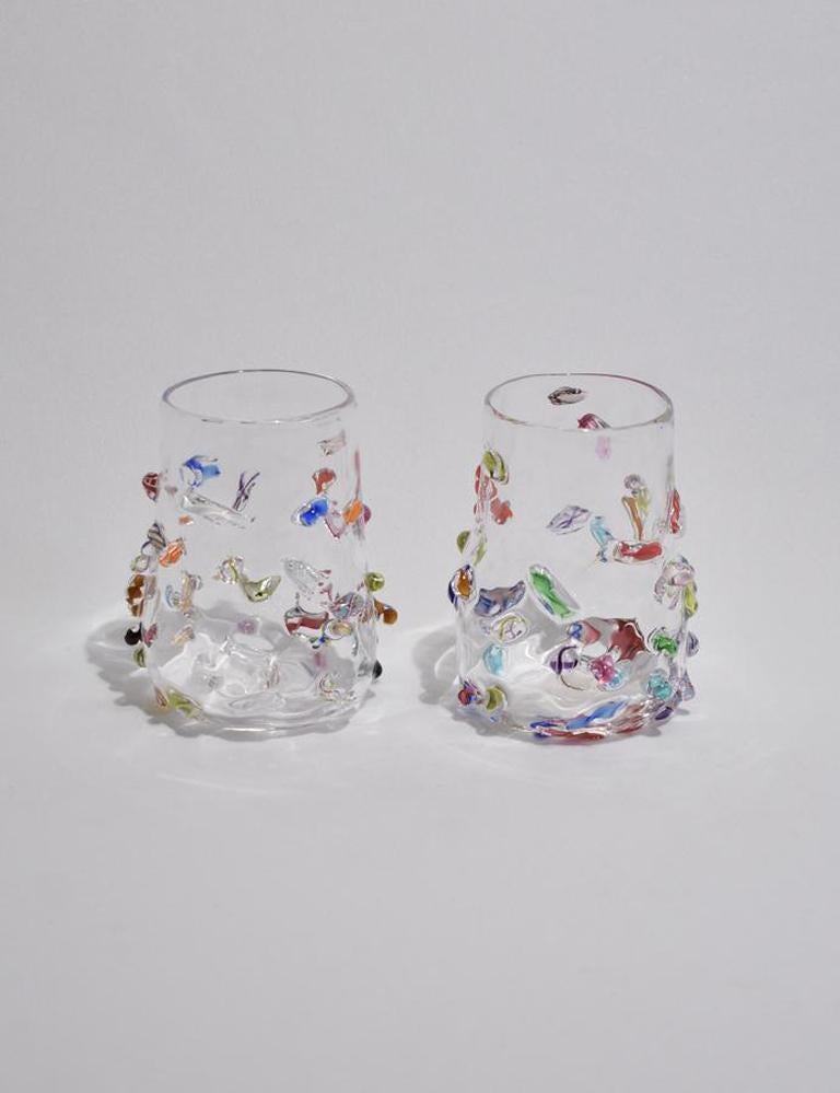 Beautiful blown glass tumbler set of two with applied colorful cane decoration. Handmade in USA by Lisa Stover exclusively for Casa Shop. 

Please note: Due to the handmade nature of these tumblers, subtle variations in form and finish are to be